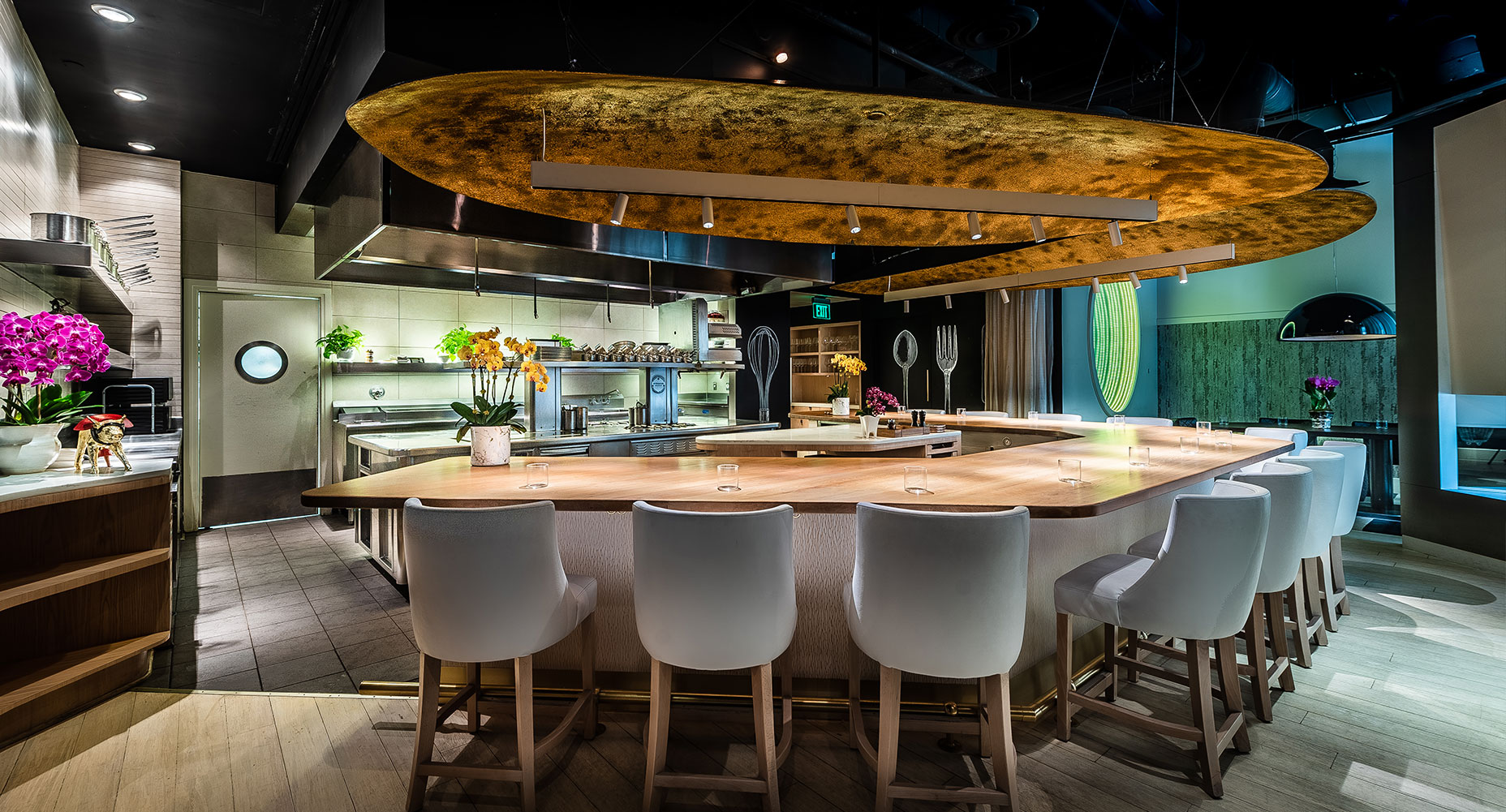 a vibrant restaurant with white chairs