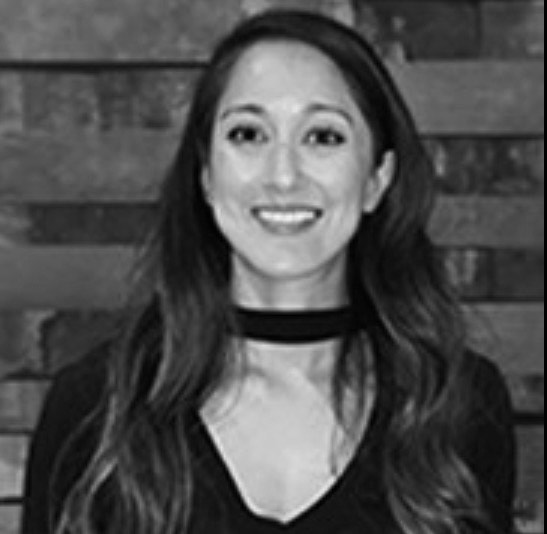 a woman smiling at camera