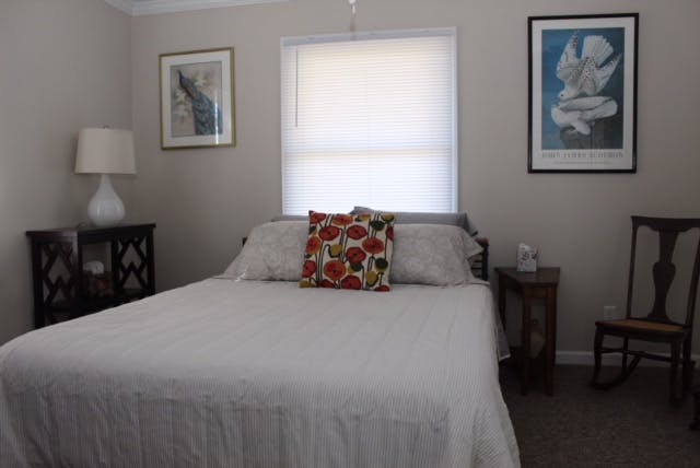 a bedroom with a bed in a hotel room