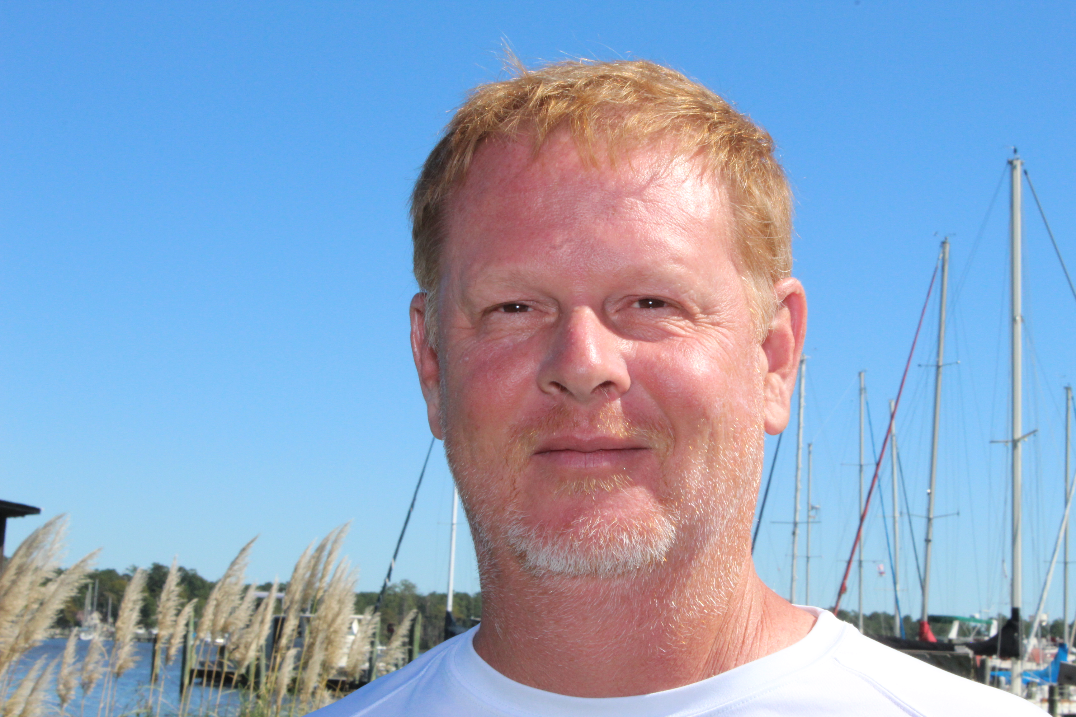 a man holding a fish