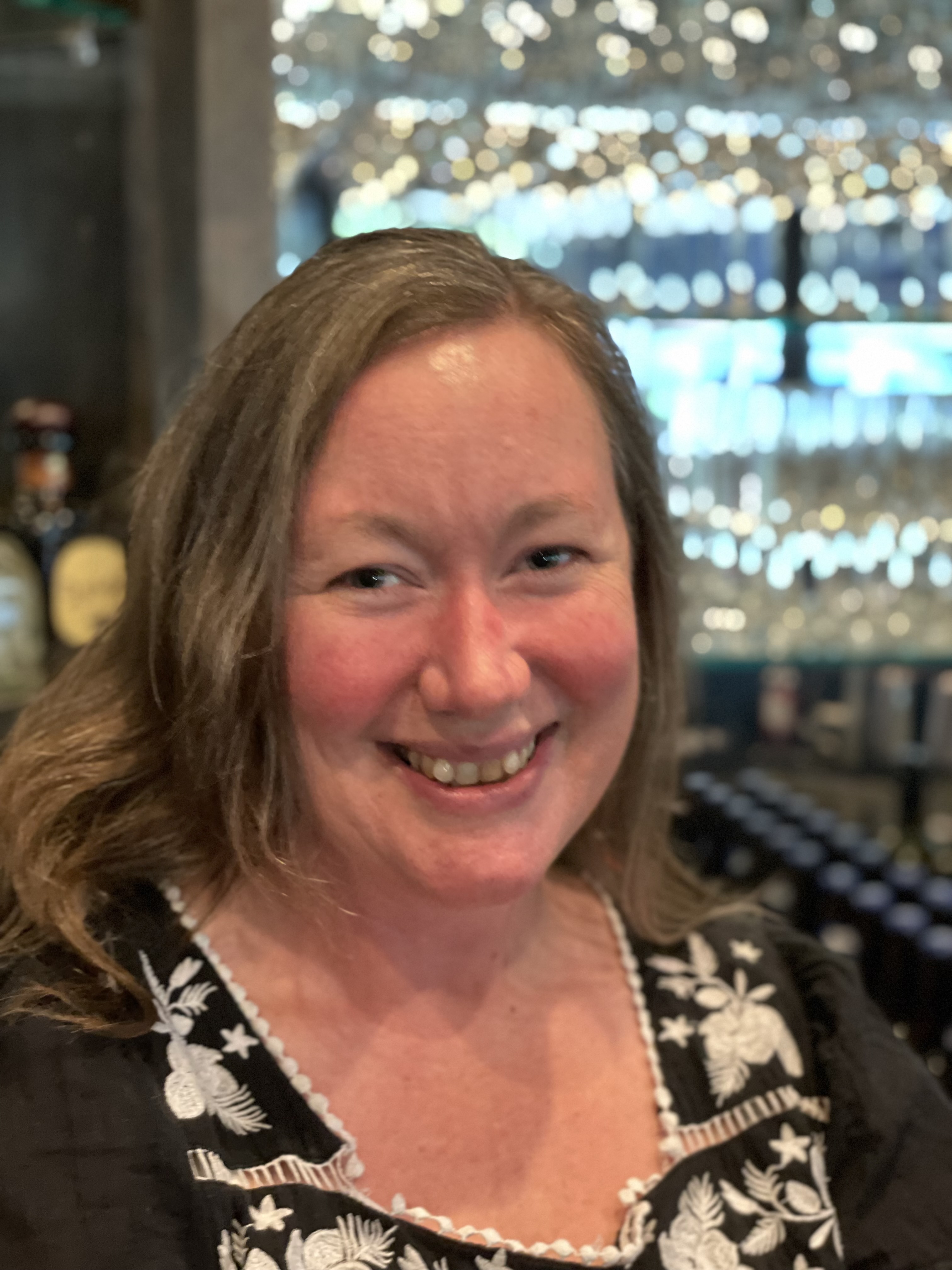 a woman smiling for the camera