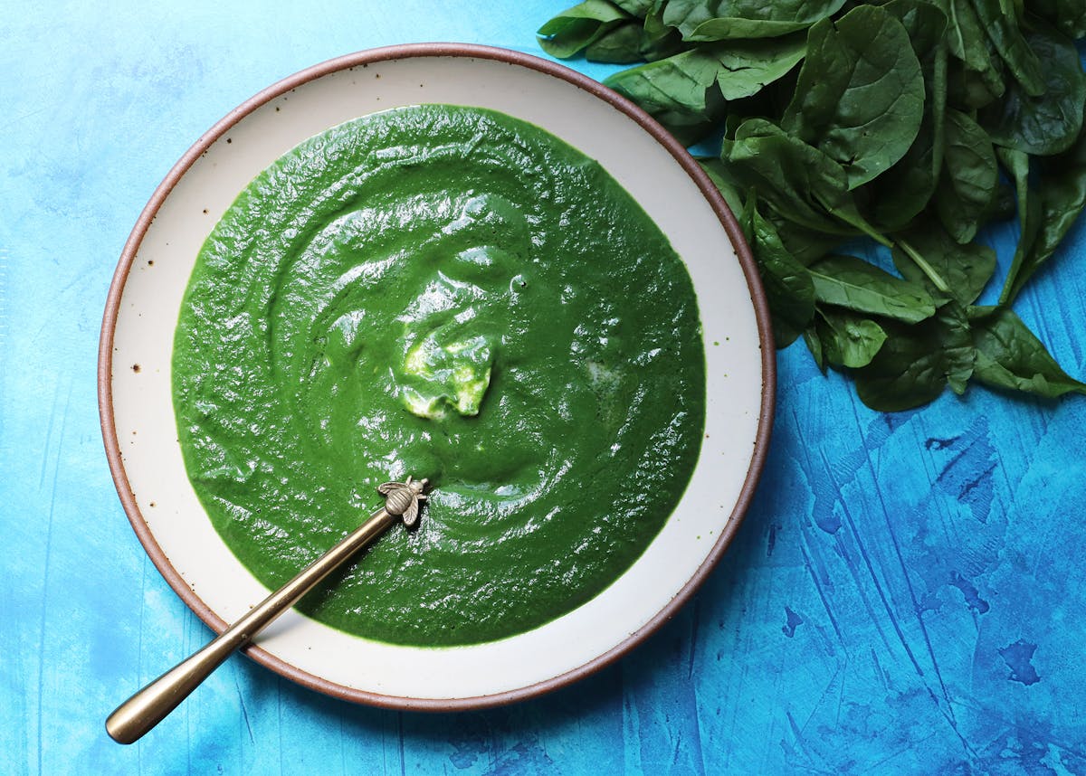 a close up of a green plate