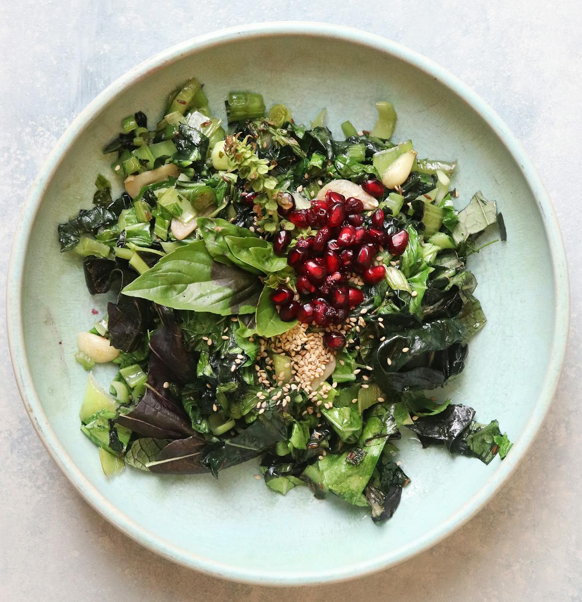 a bowl of salad on a plate