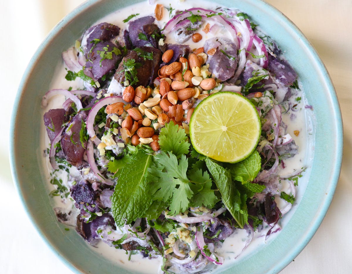 a bowl of salad on a plate