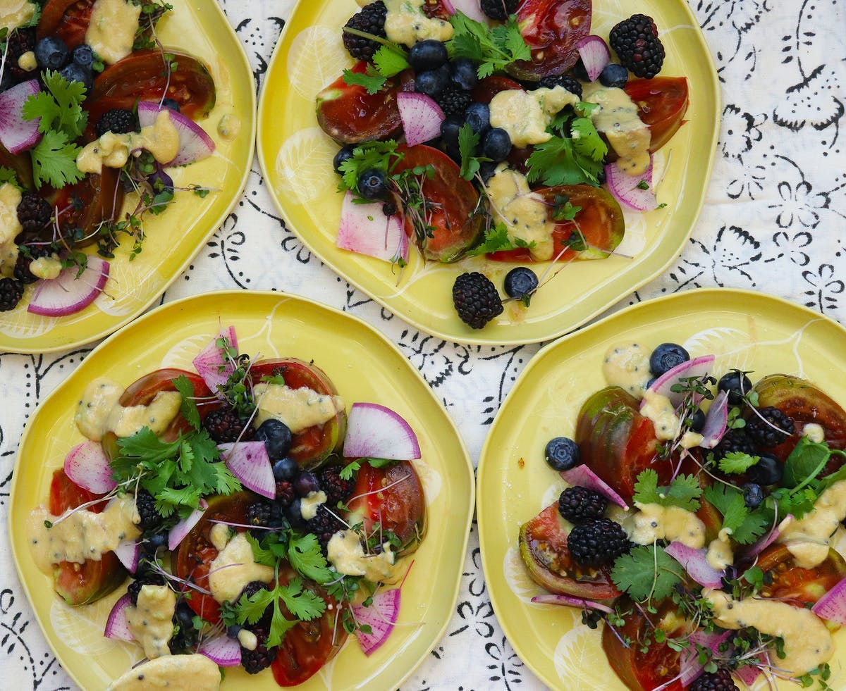 a meal of pizza and salad on a plate