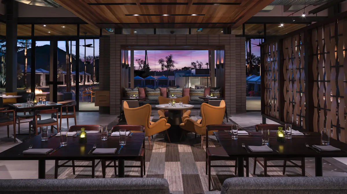 a restaurant with tables and chairs