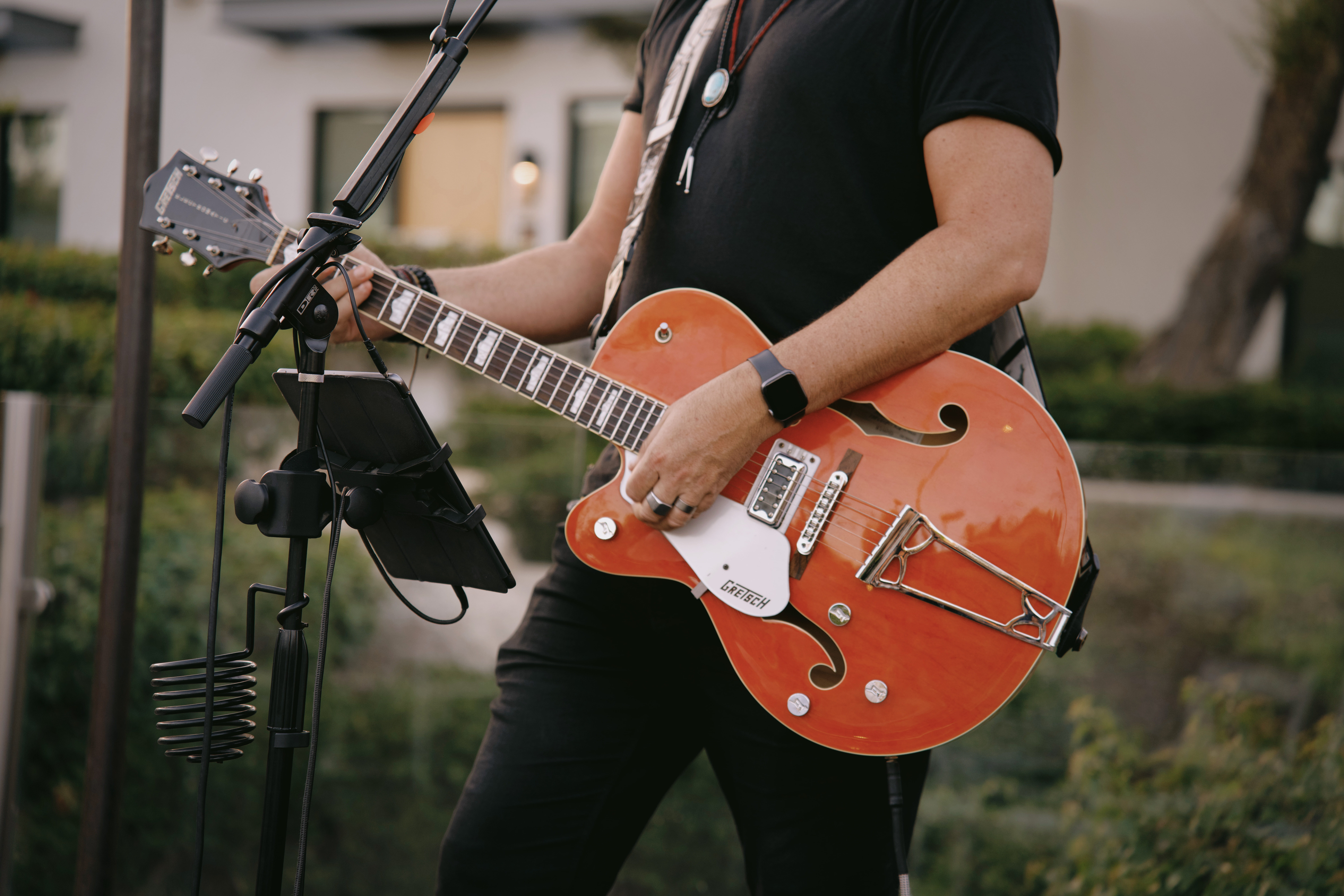 a man playing a guitar