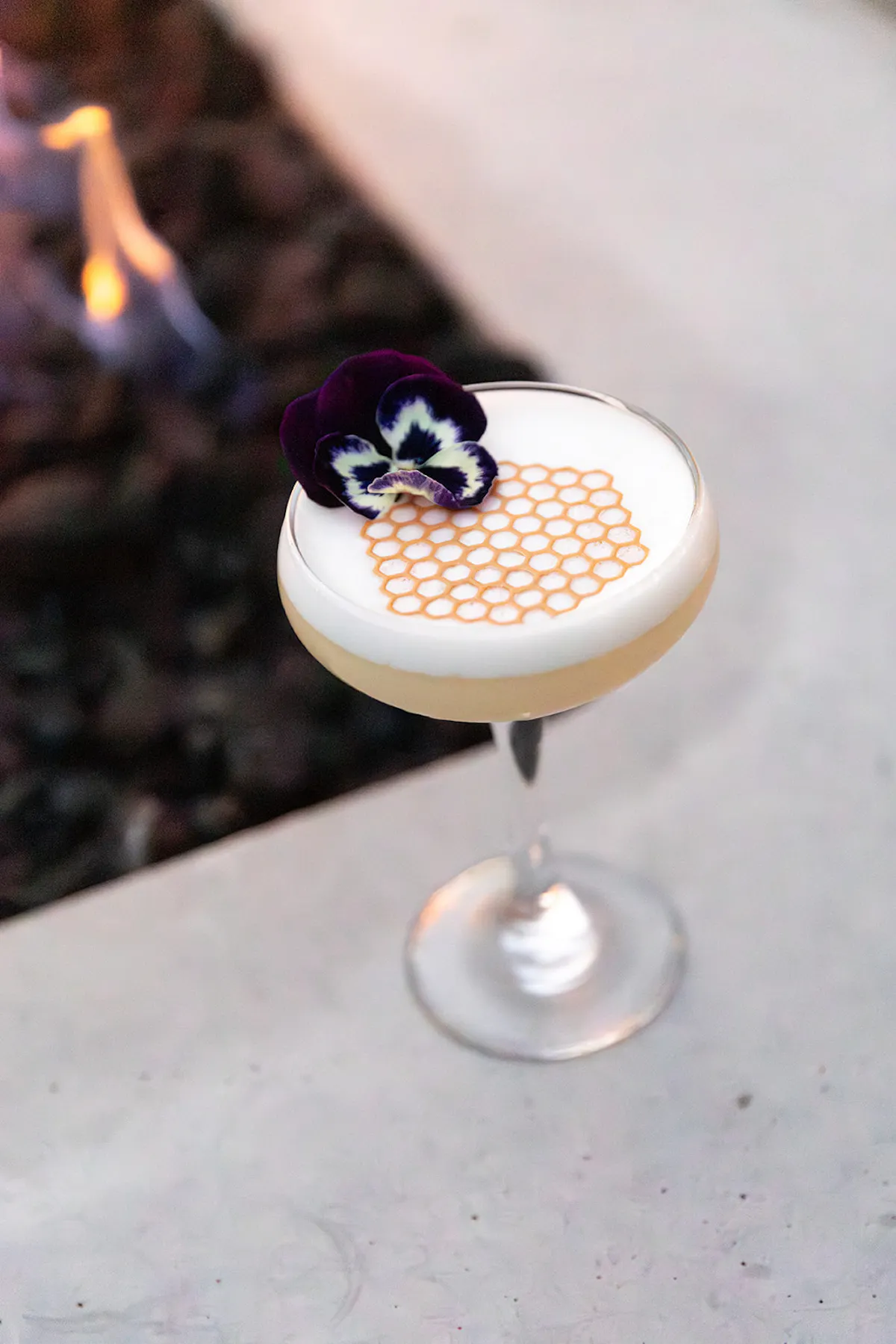a glass with a drink on top