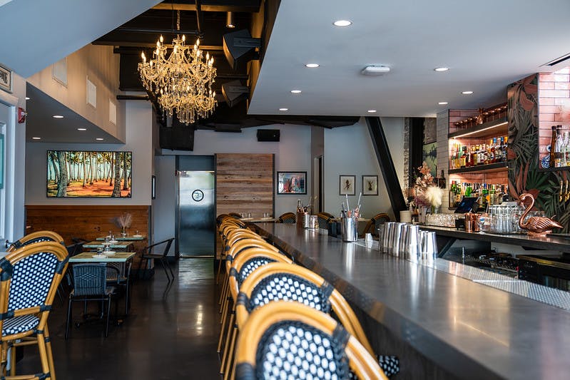 a dining room table in front of a store