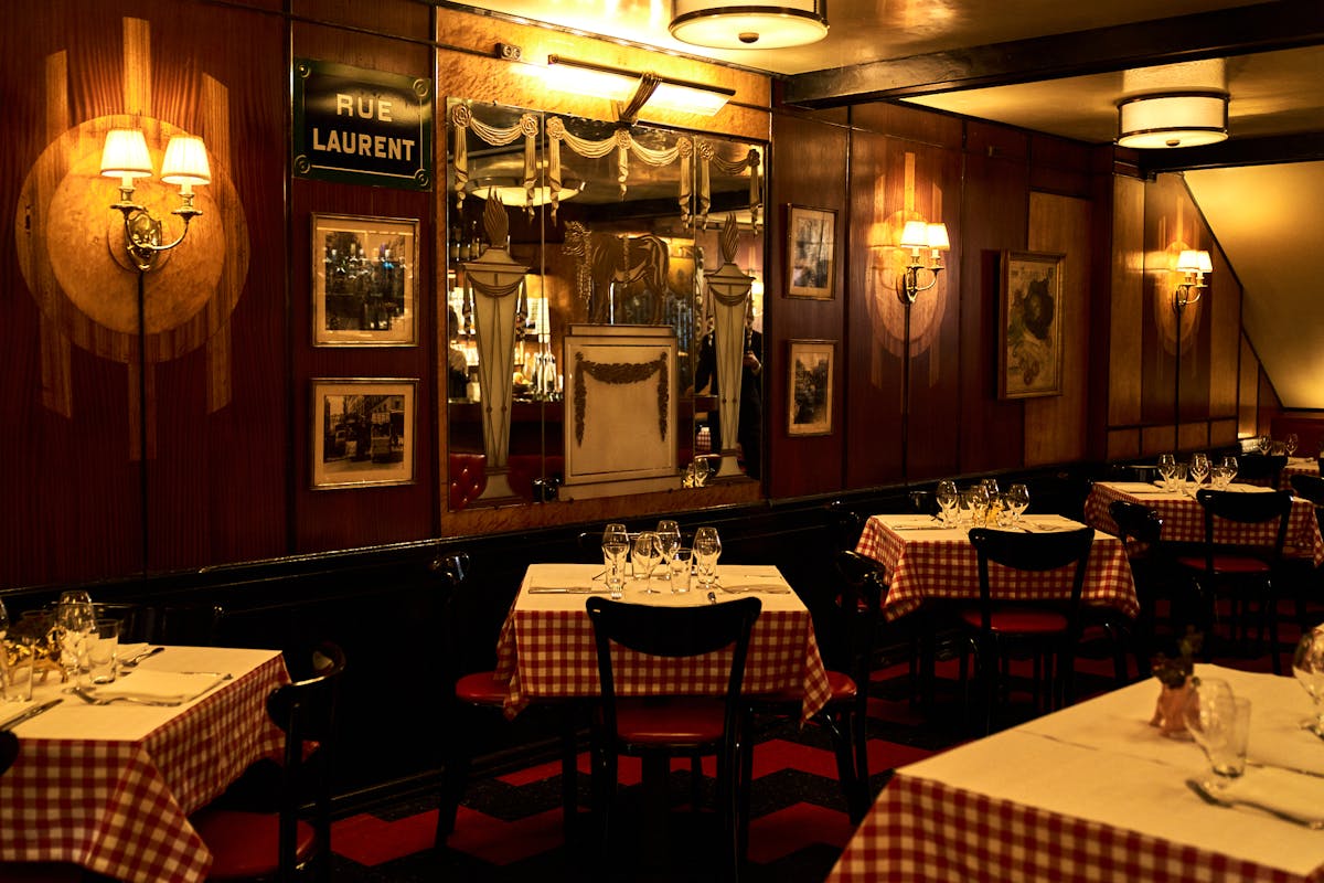 a room with a couch and table in a restaurant