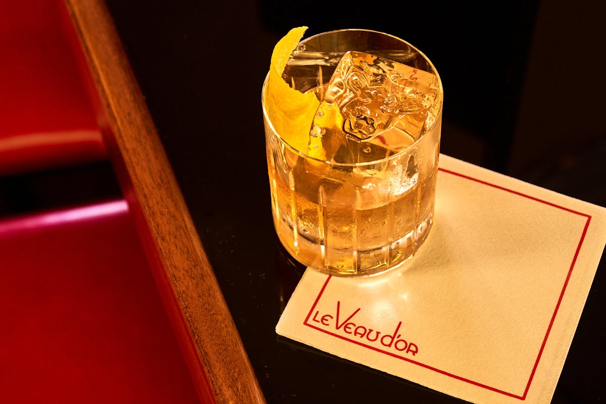 a glass cup on a table
