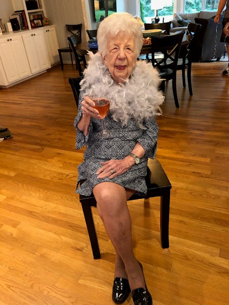 a person sitting on a wooden floor