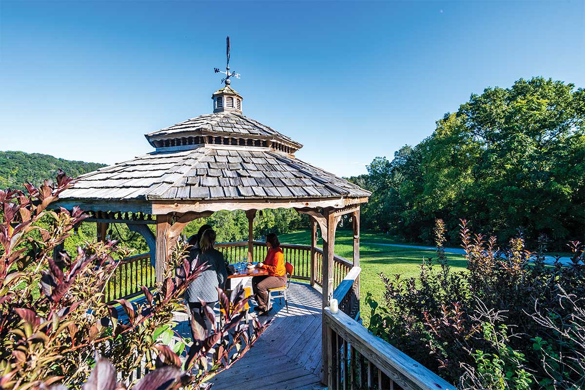 a group of people on a bridge