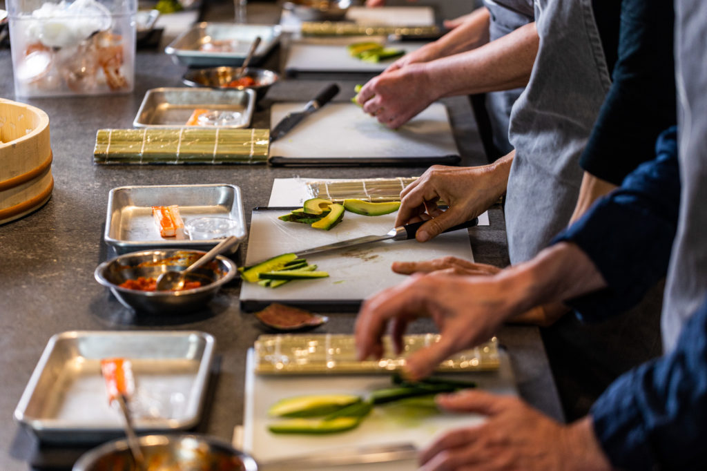 a person preparing food on a table