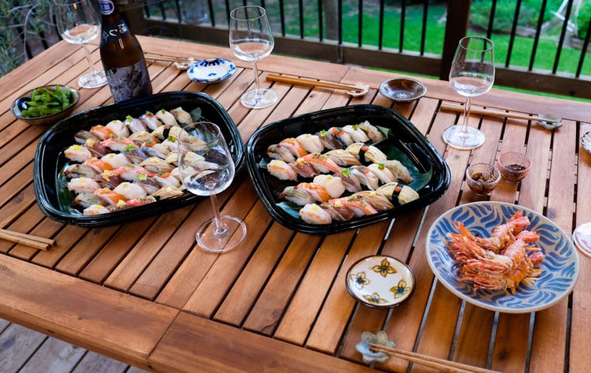 a plate of food sitting on top of a wooden table