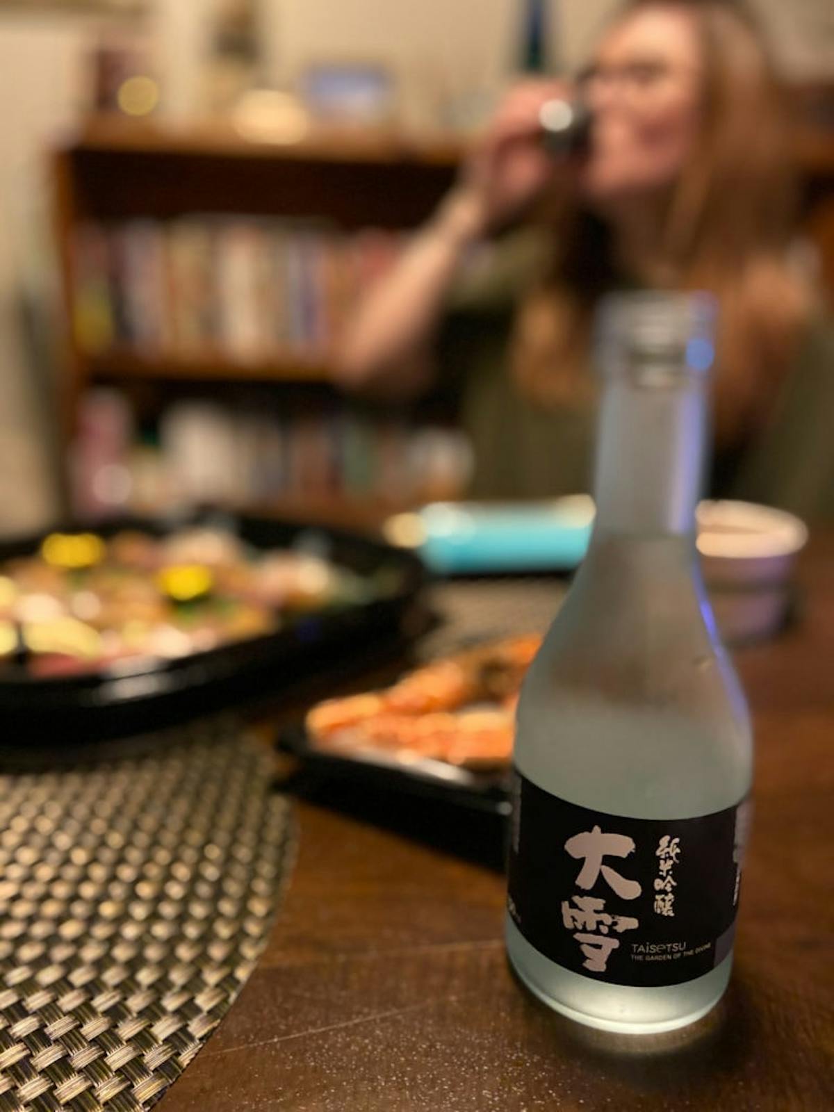 a close up of a bottle on a table