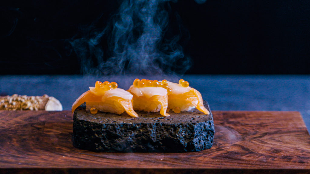 a piece of cake sitting on top of a wooden table
