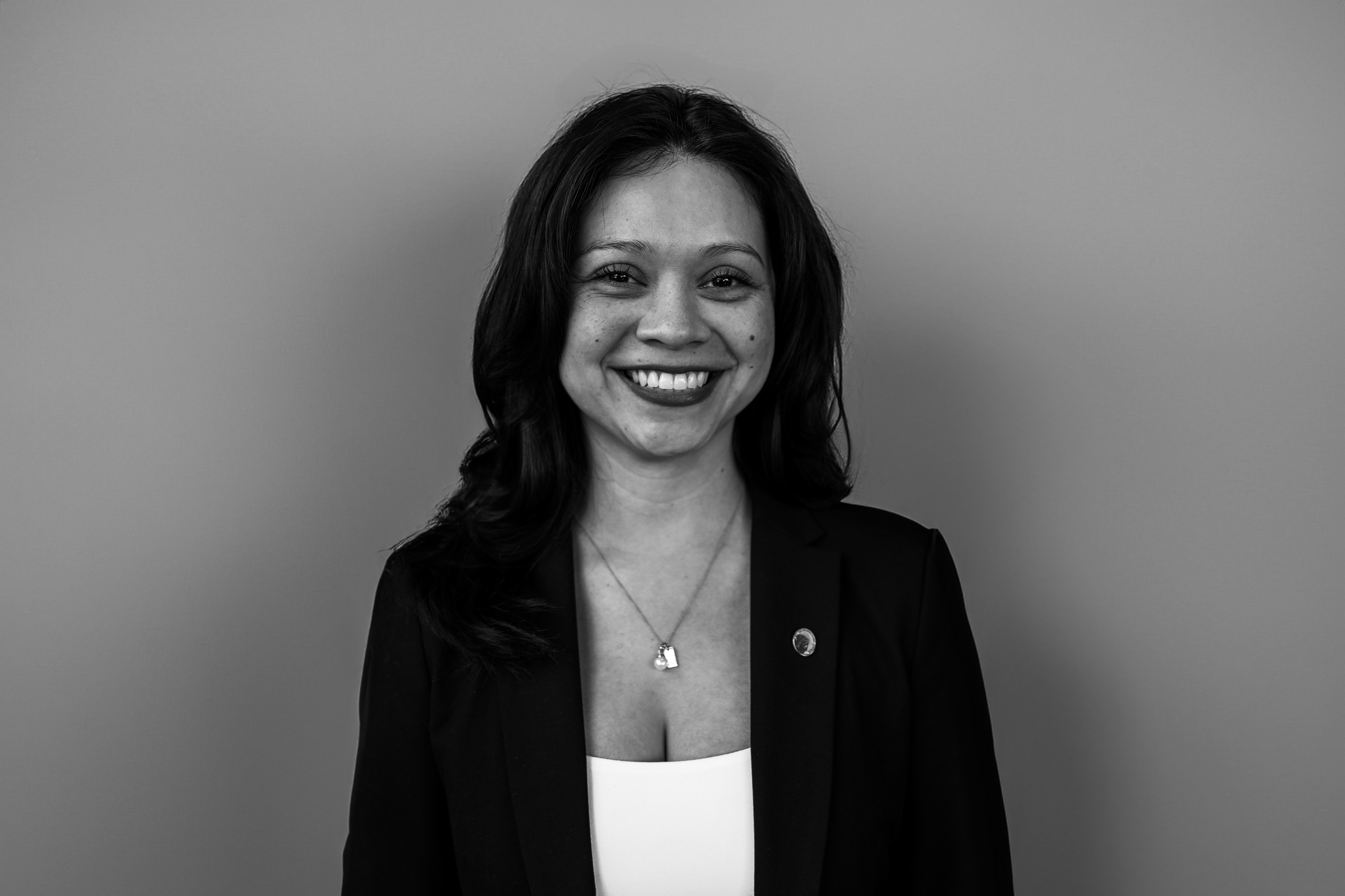 a person standing in front of a mirror posing for the camera