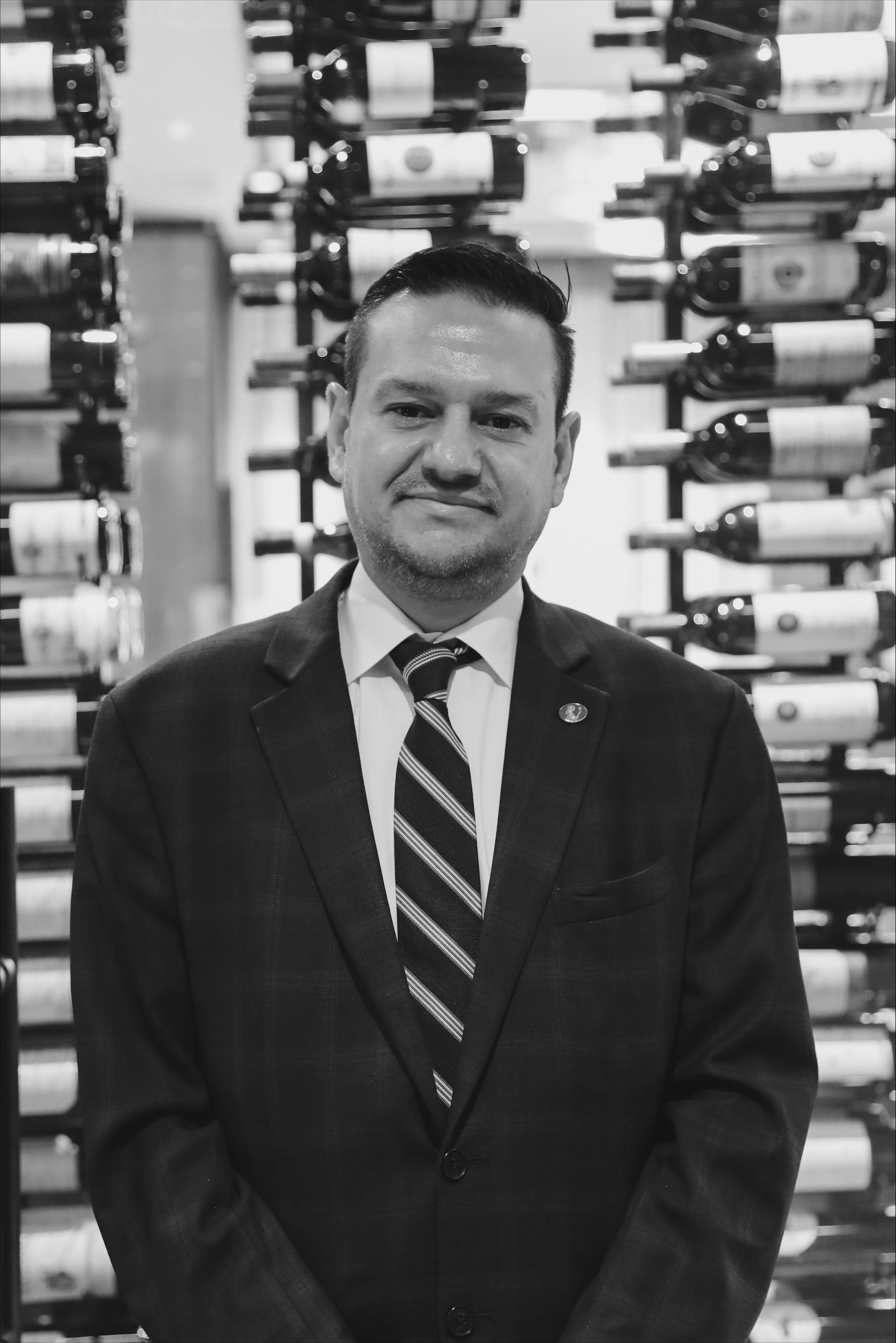 a man wearing a suit and tie