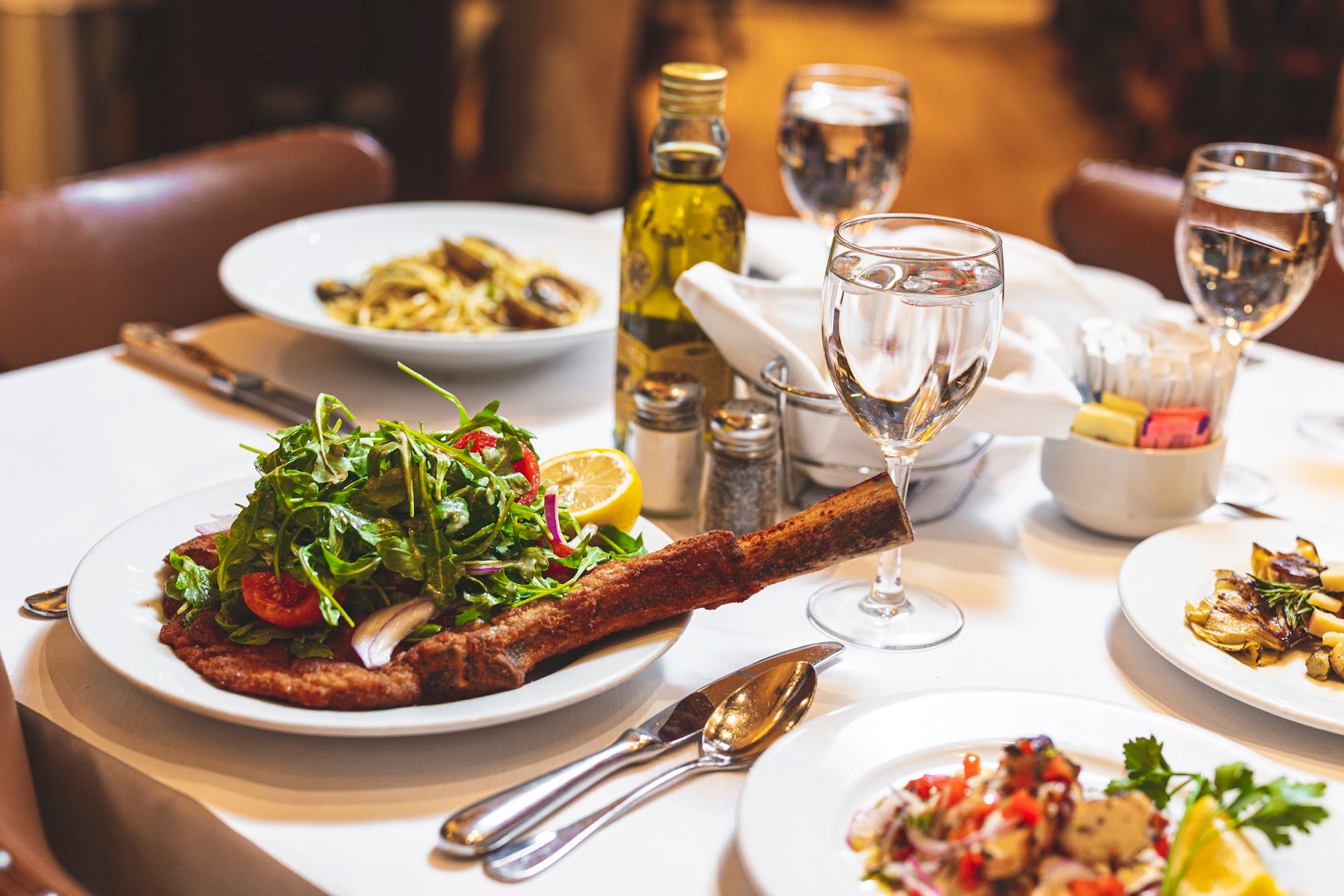 a table topped with plates of food on a plate