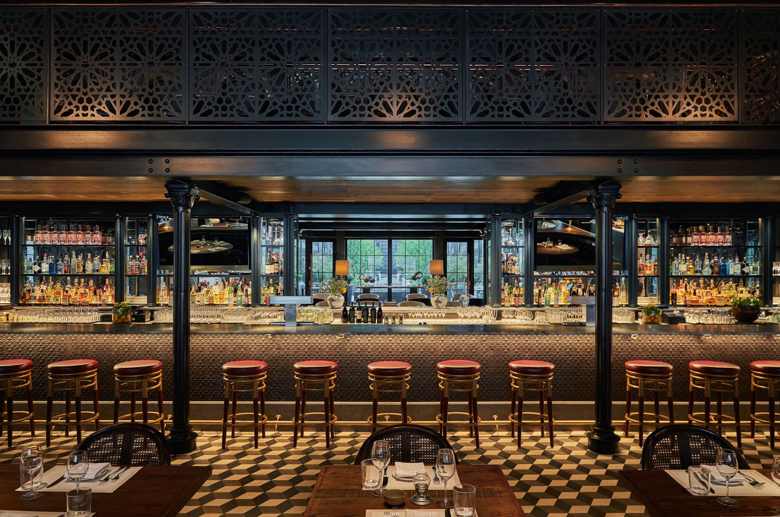 a bar with a black and white checkered floor