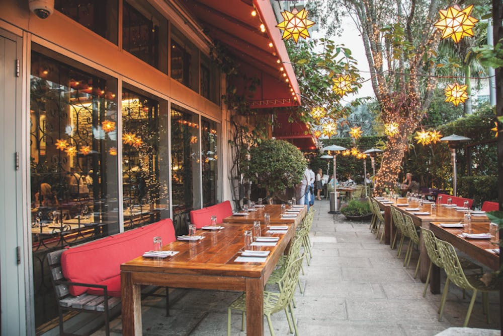 a dining room table in front of a building