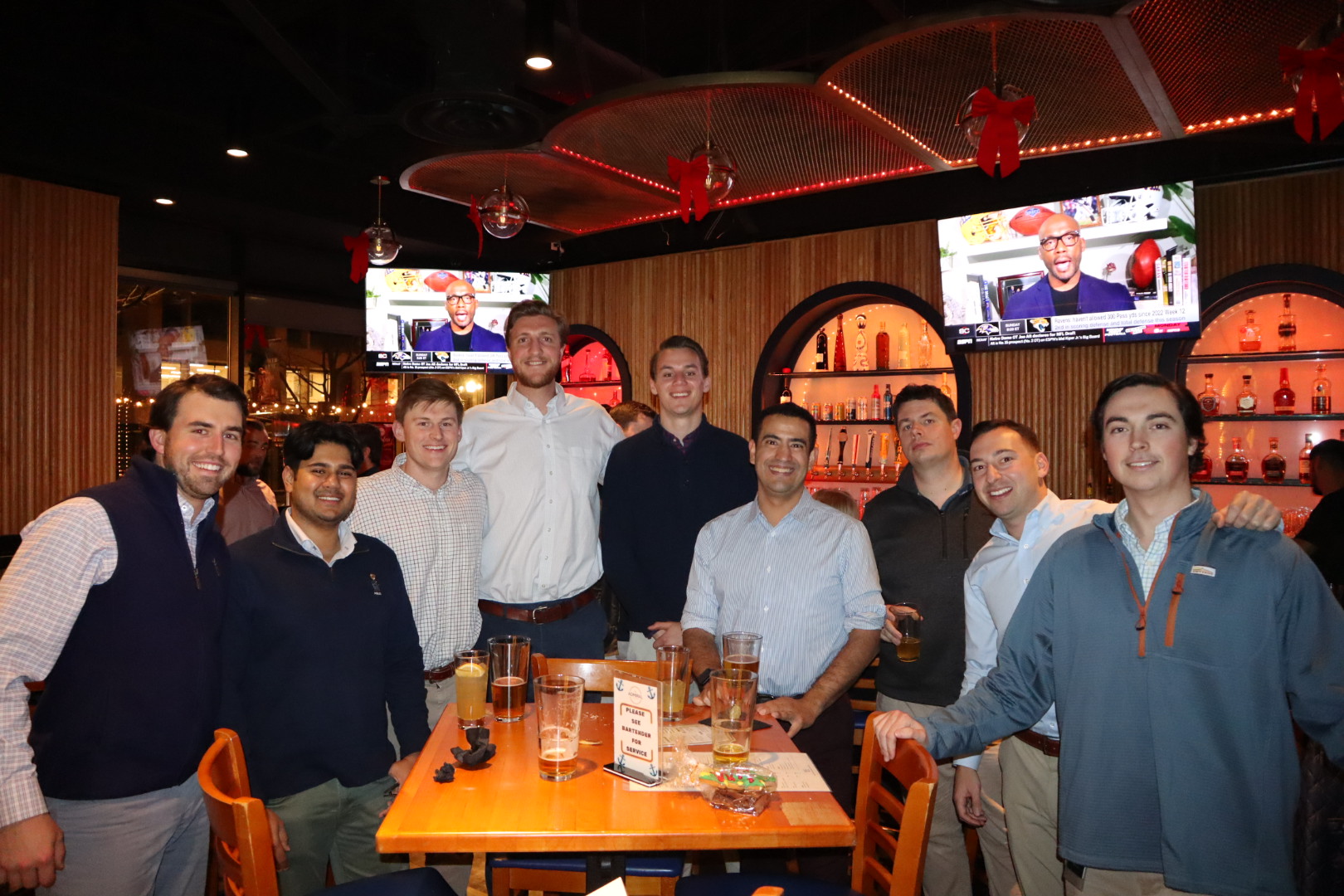 a group of people posing for the camera