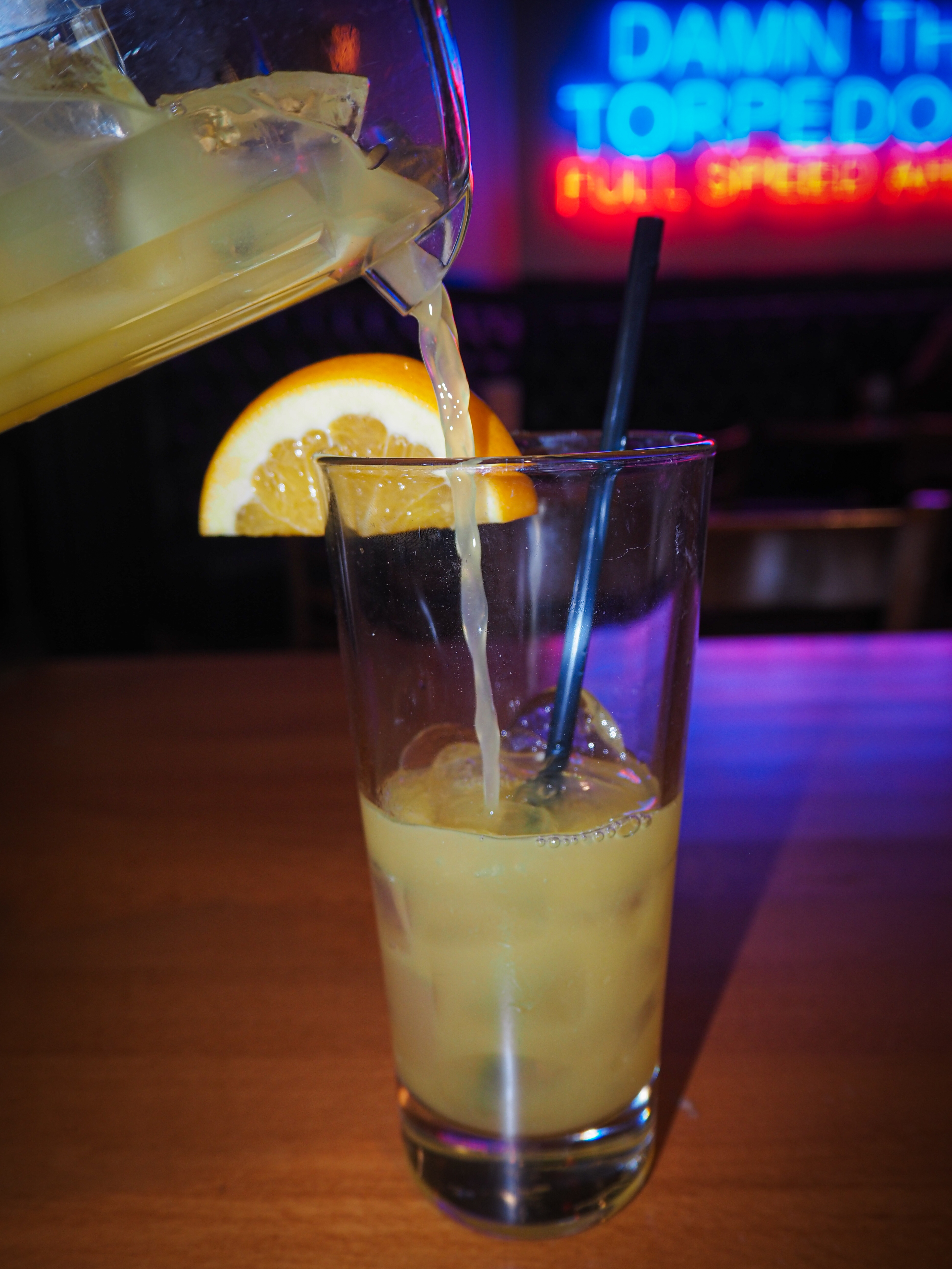 a glass of beer on a table