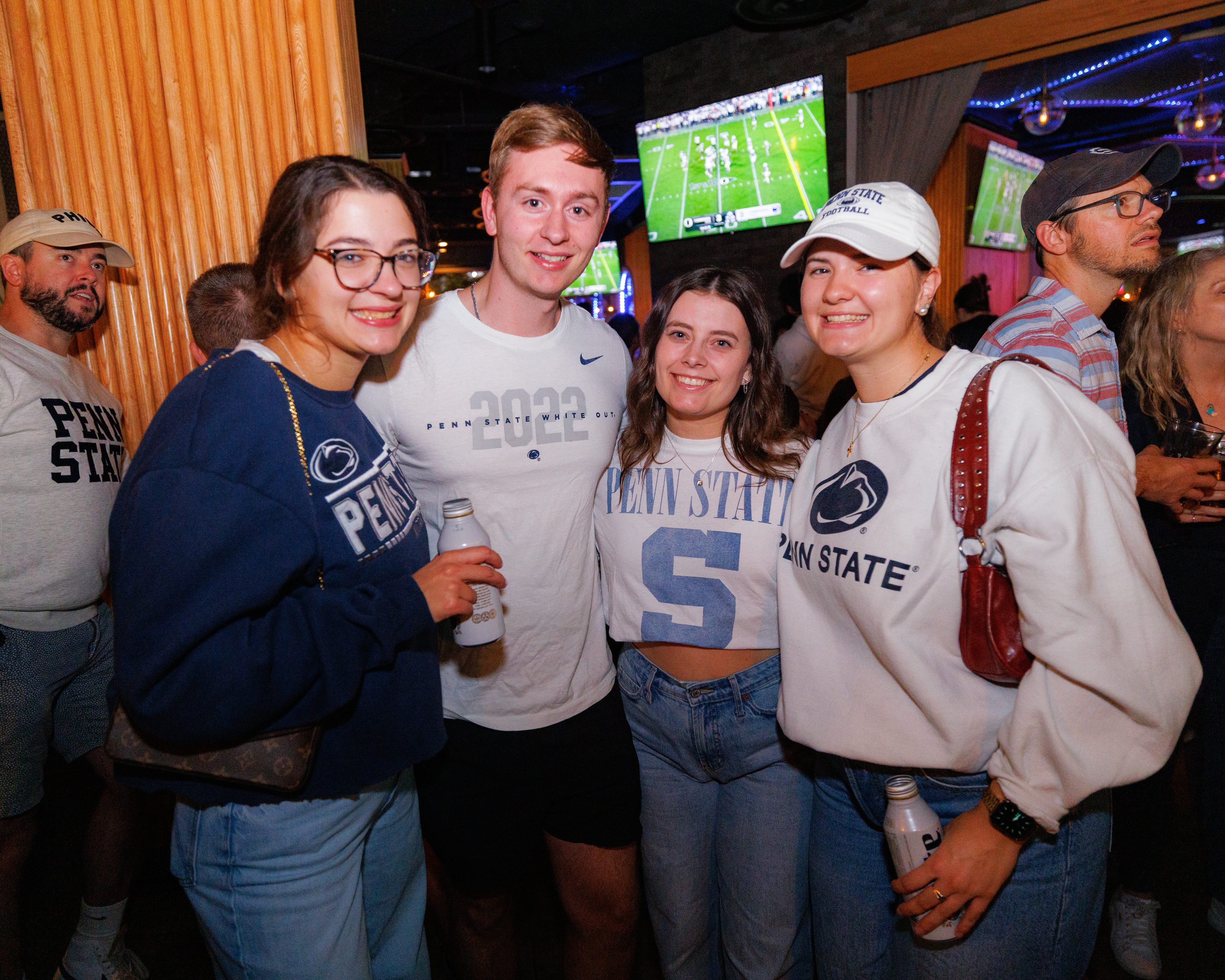 a group of people posing for a photo