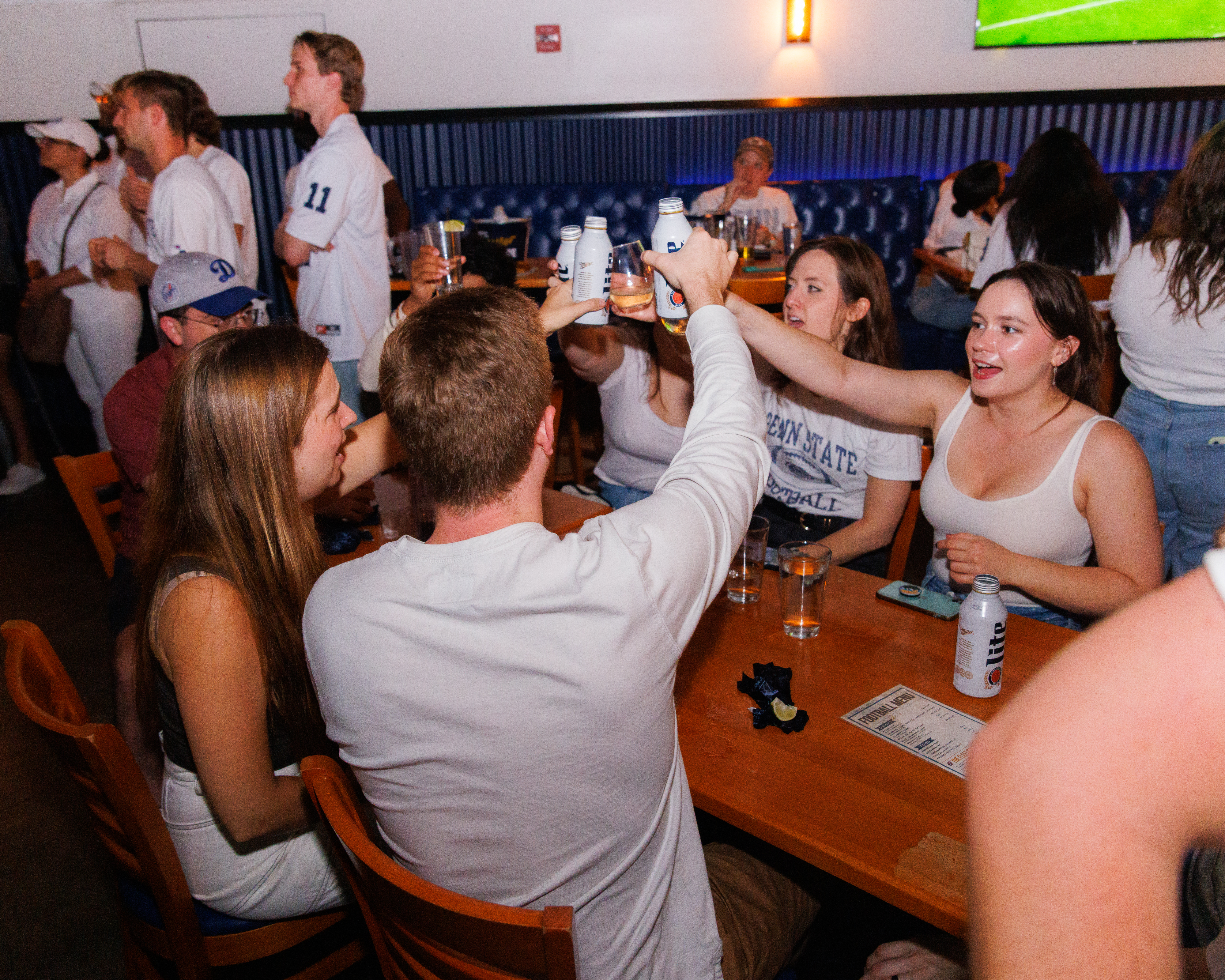 a group of people sitting at a table
