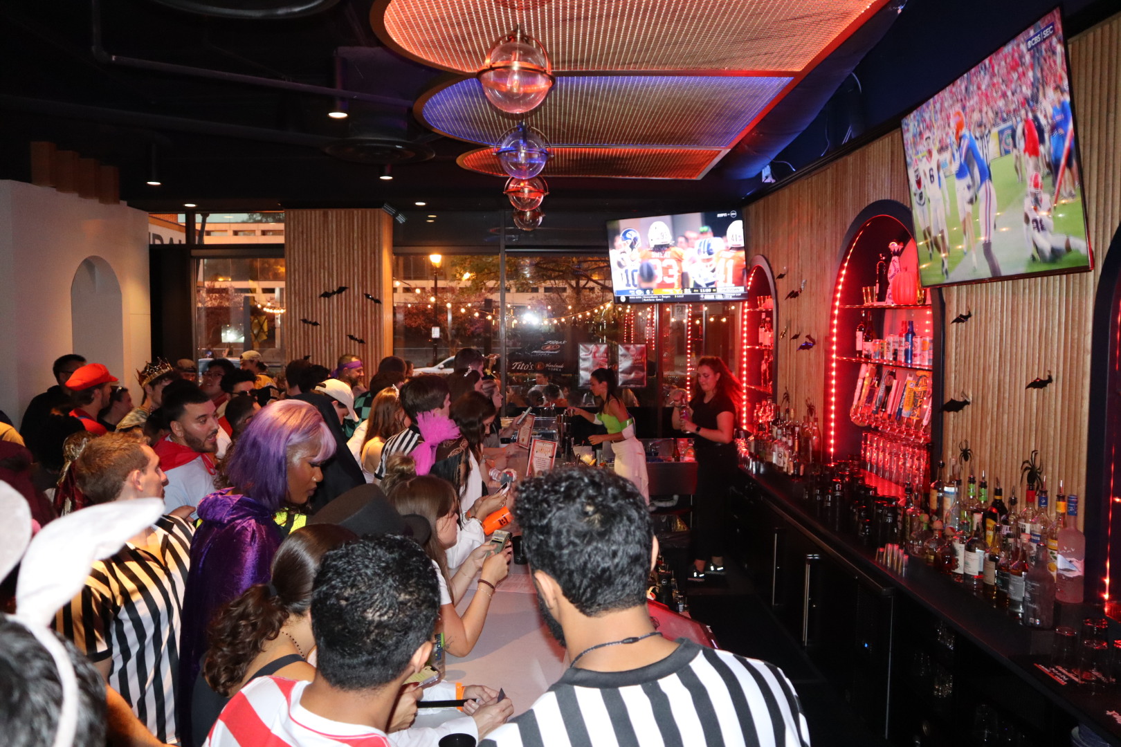 a group of people standing in front of a crowd