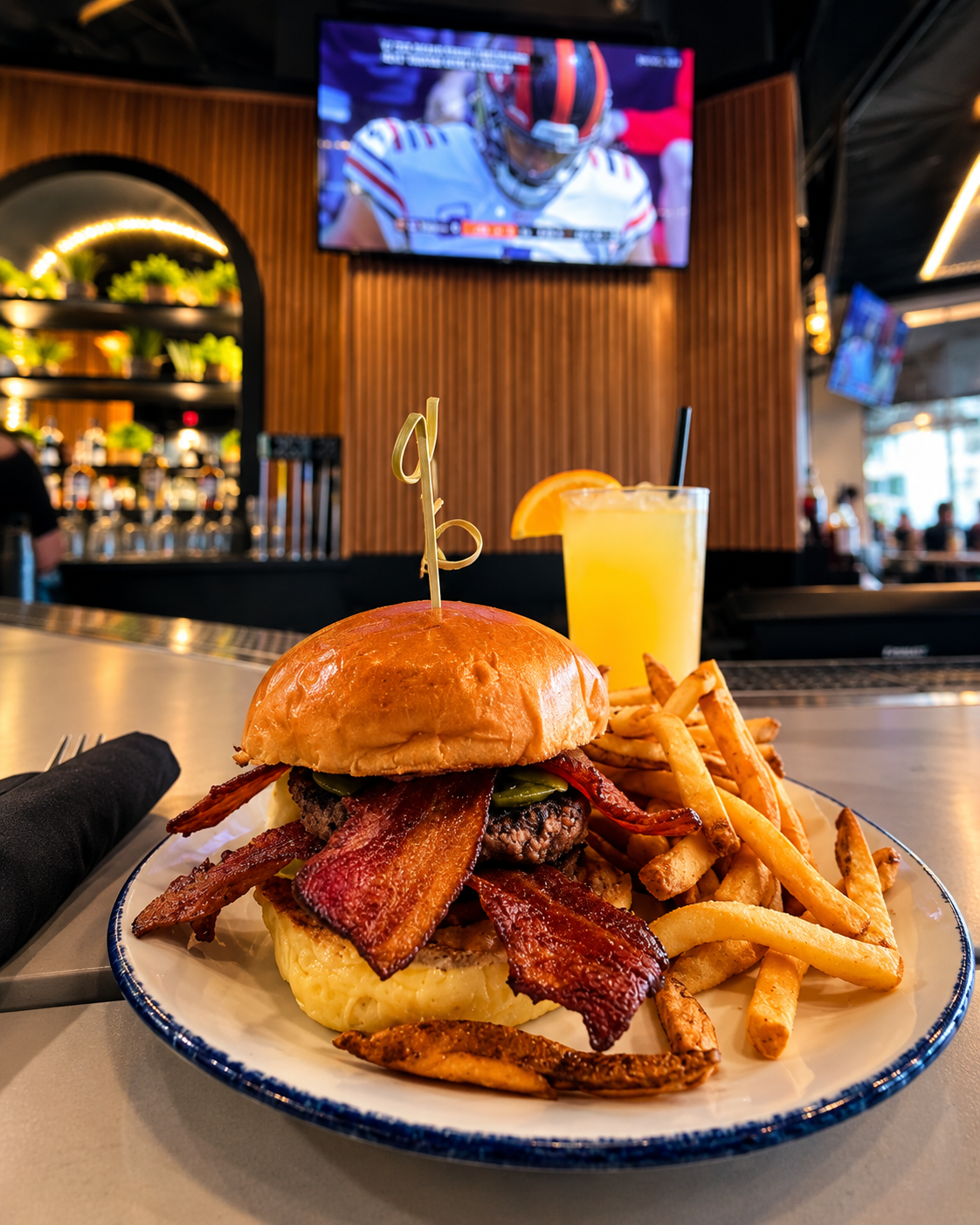 a burger and fries on a plate