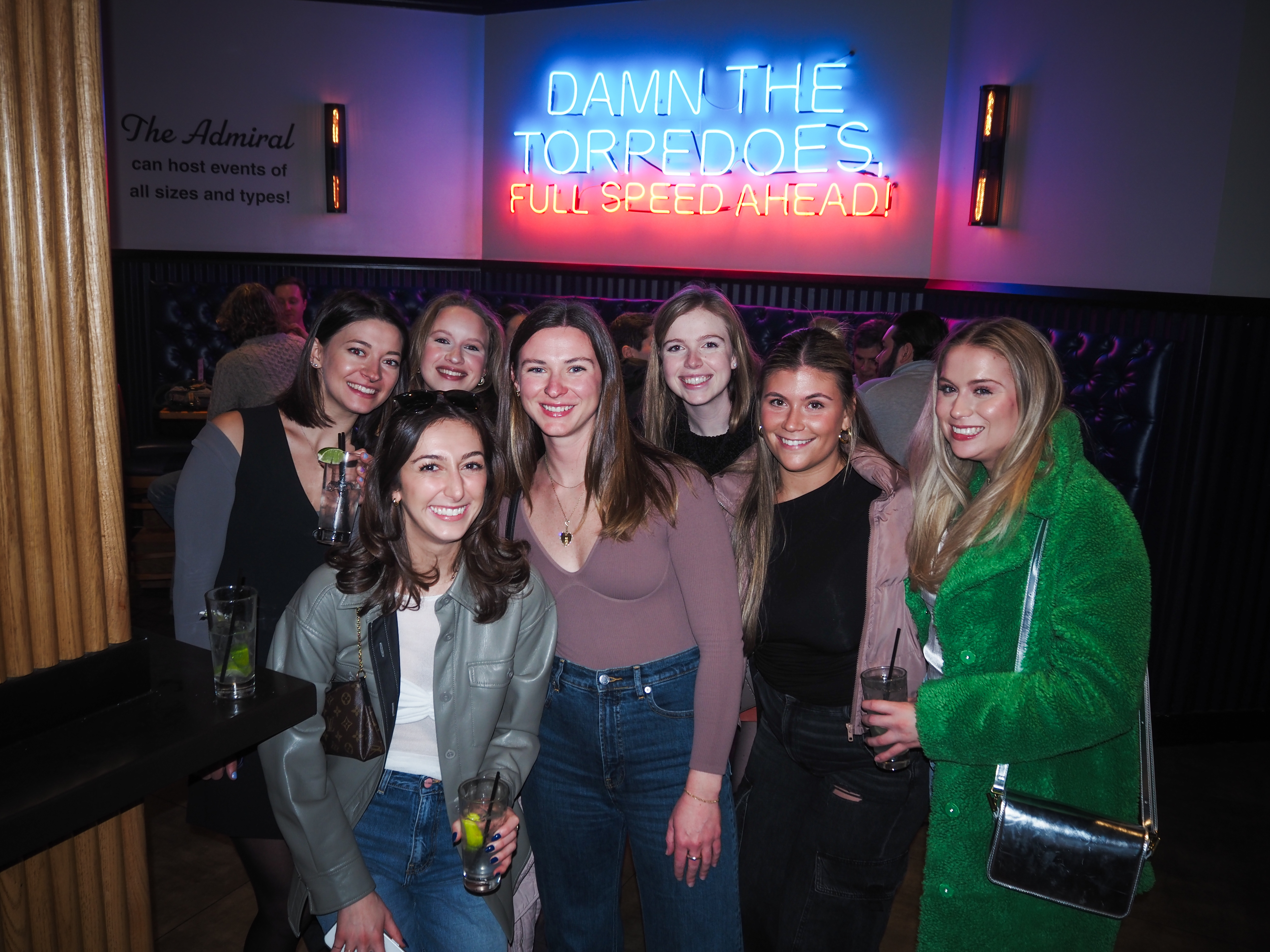 a group of people posing for a photo