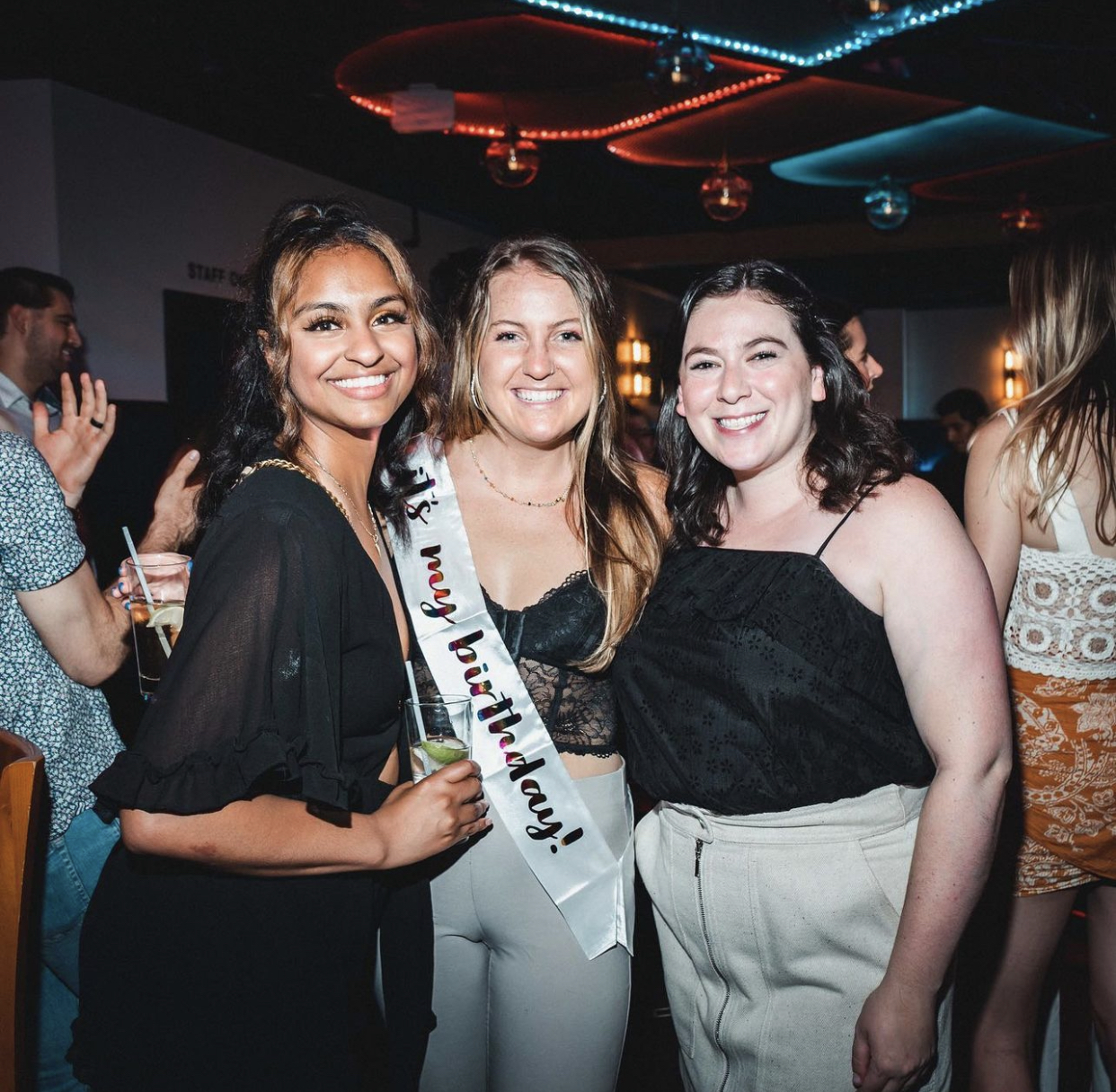 a group of people posing for a photo