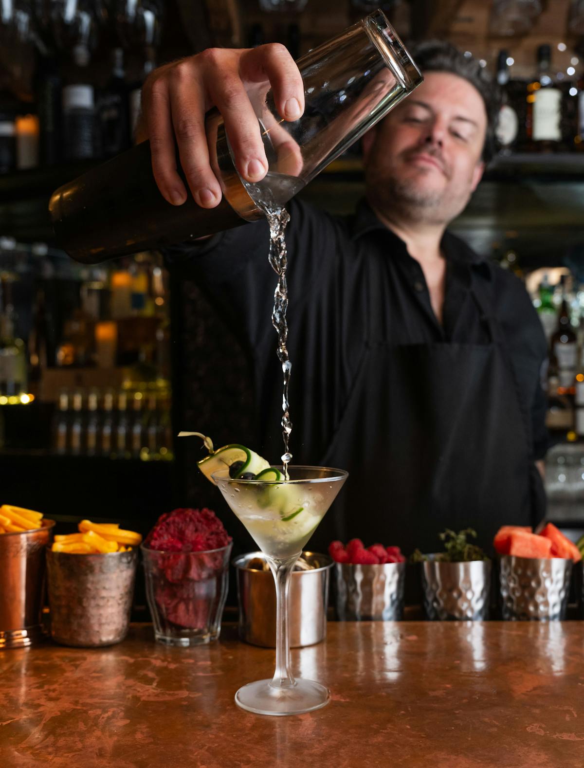 a person holding a glass of wine