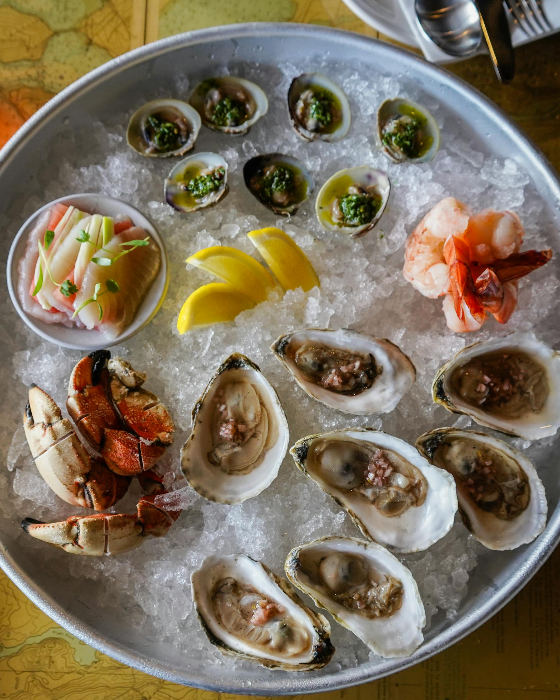 a shellfish platter of oysters clams and shrimp