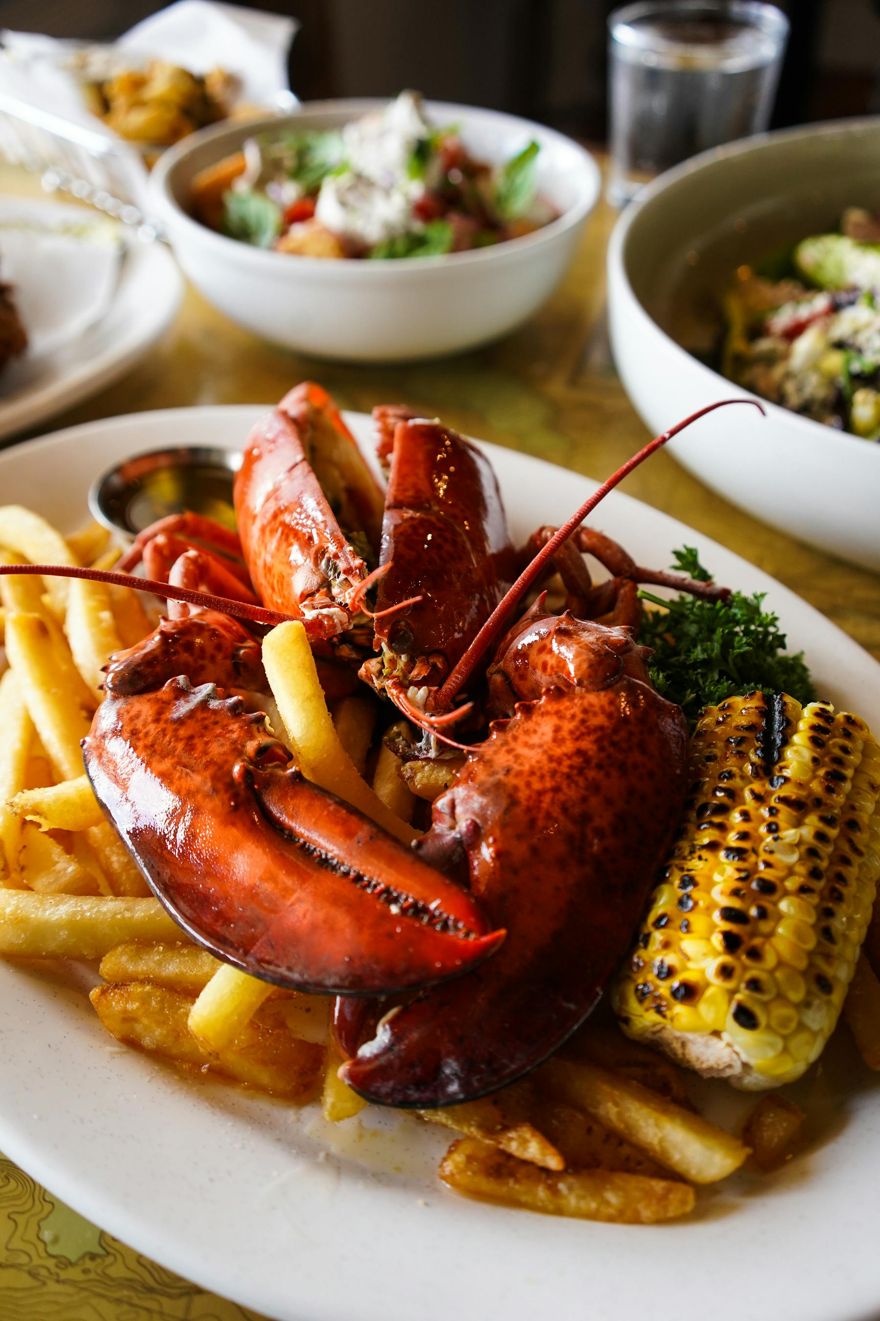lobster platter with corn and fries