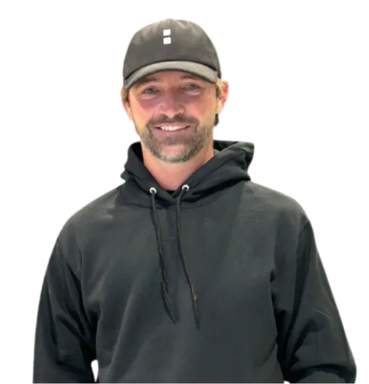 a man wearing a hat and a sweatshirt