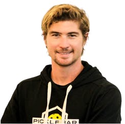 a man smiling for the camera