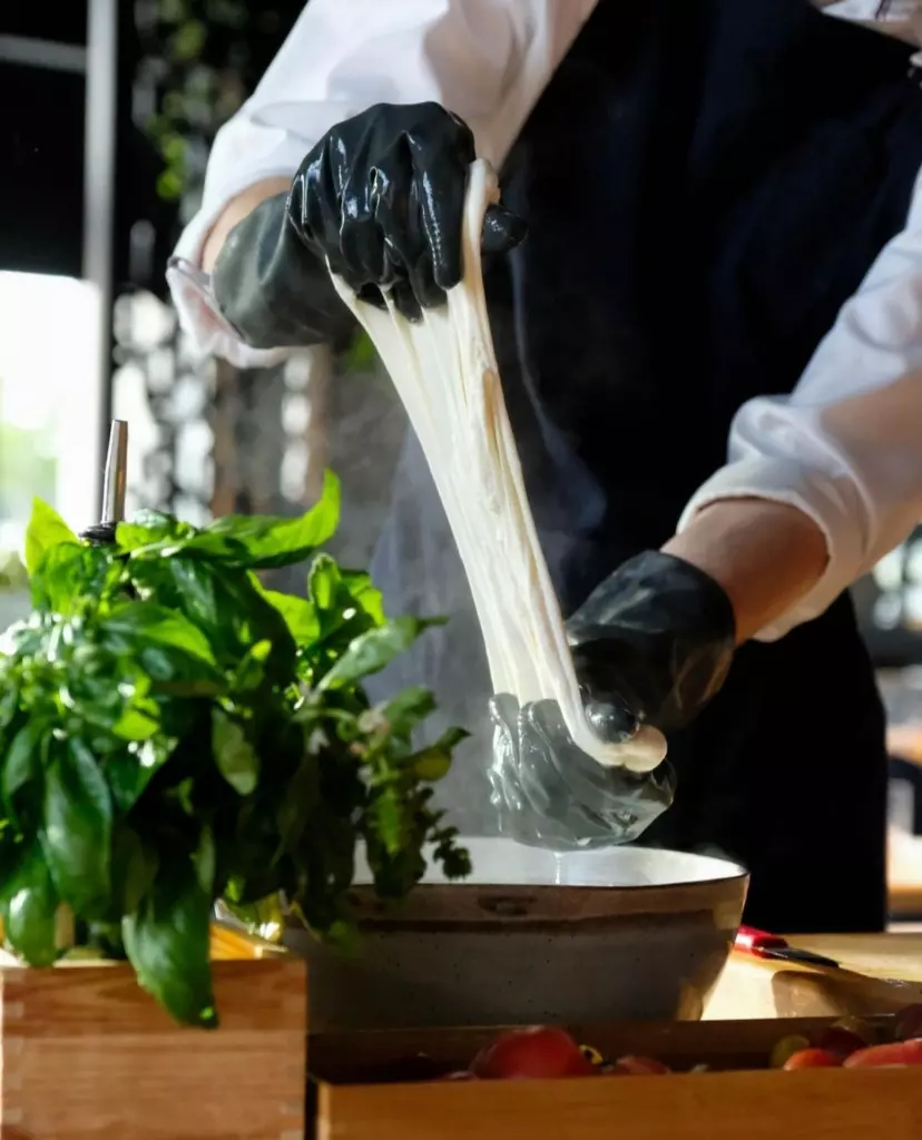 a person preparing food in a kitchen