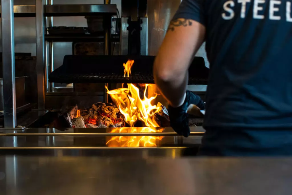 a man that is cooking some food
