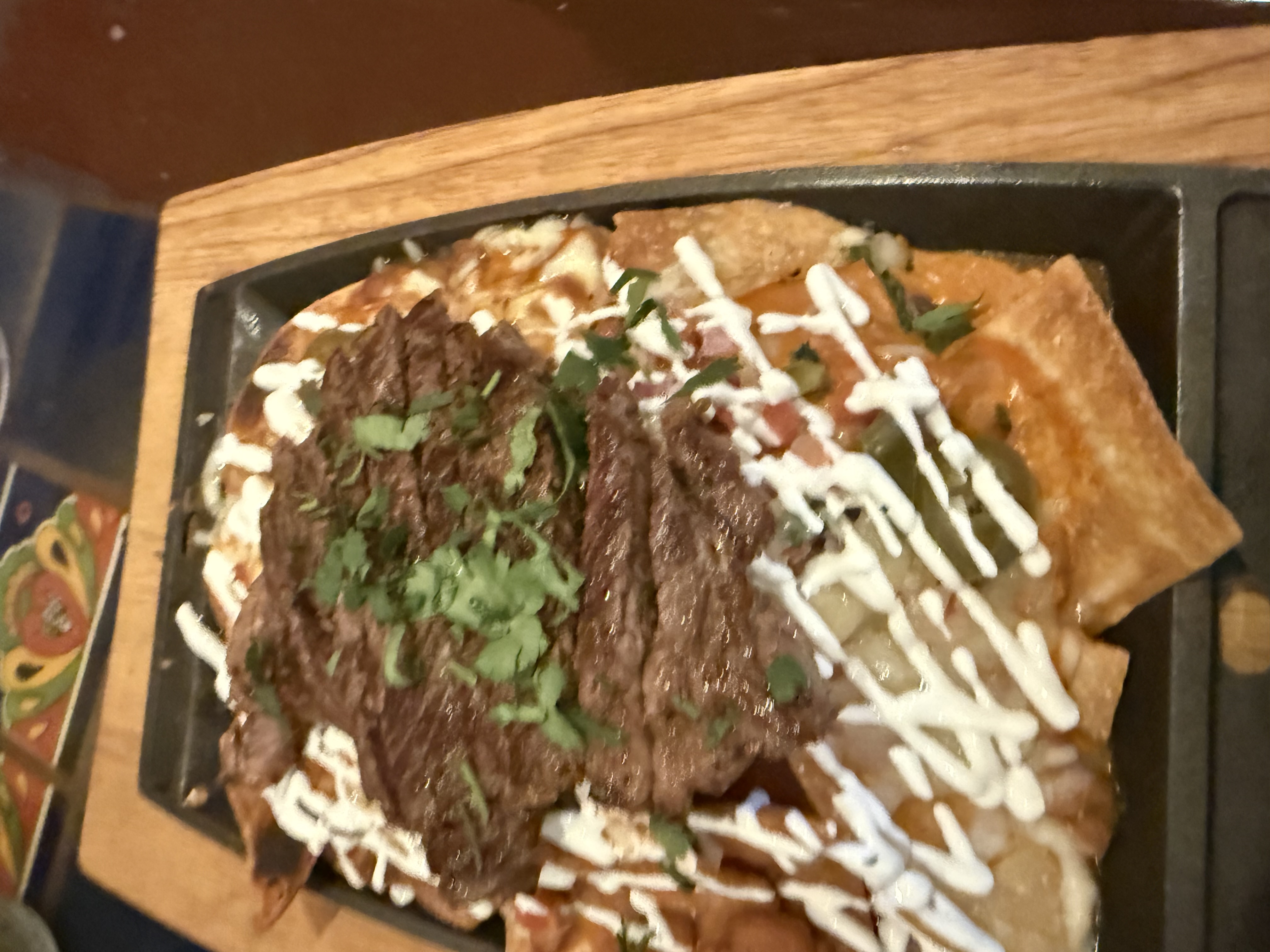 a plate of food on a wood surface