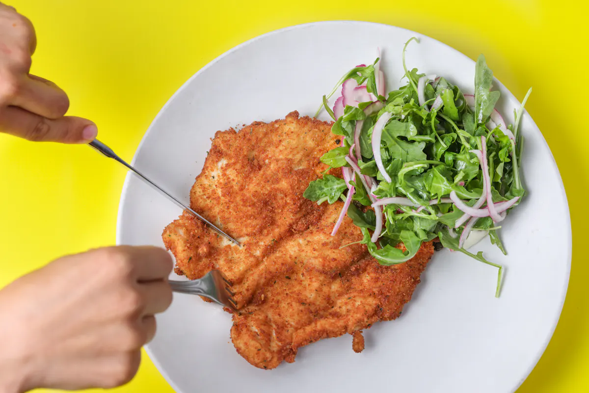 a plate of food with a salad
