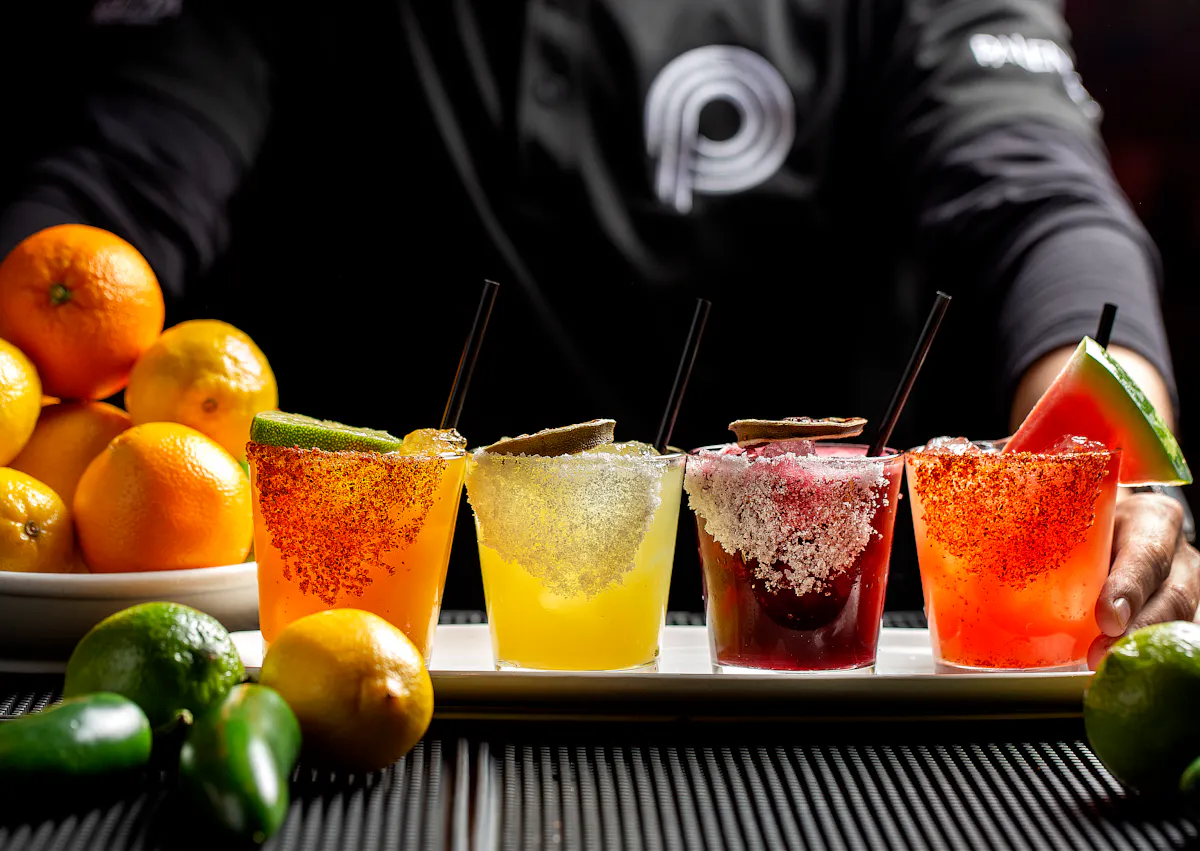 a bowl of oranges on a table