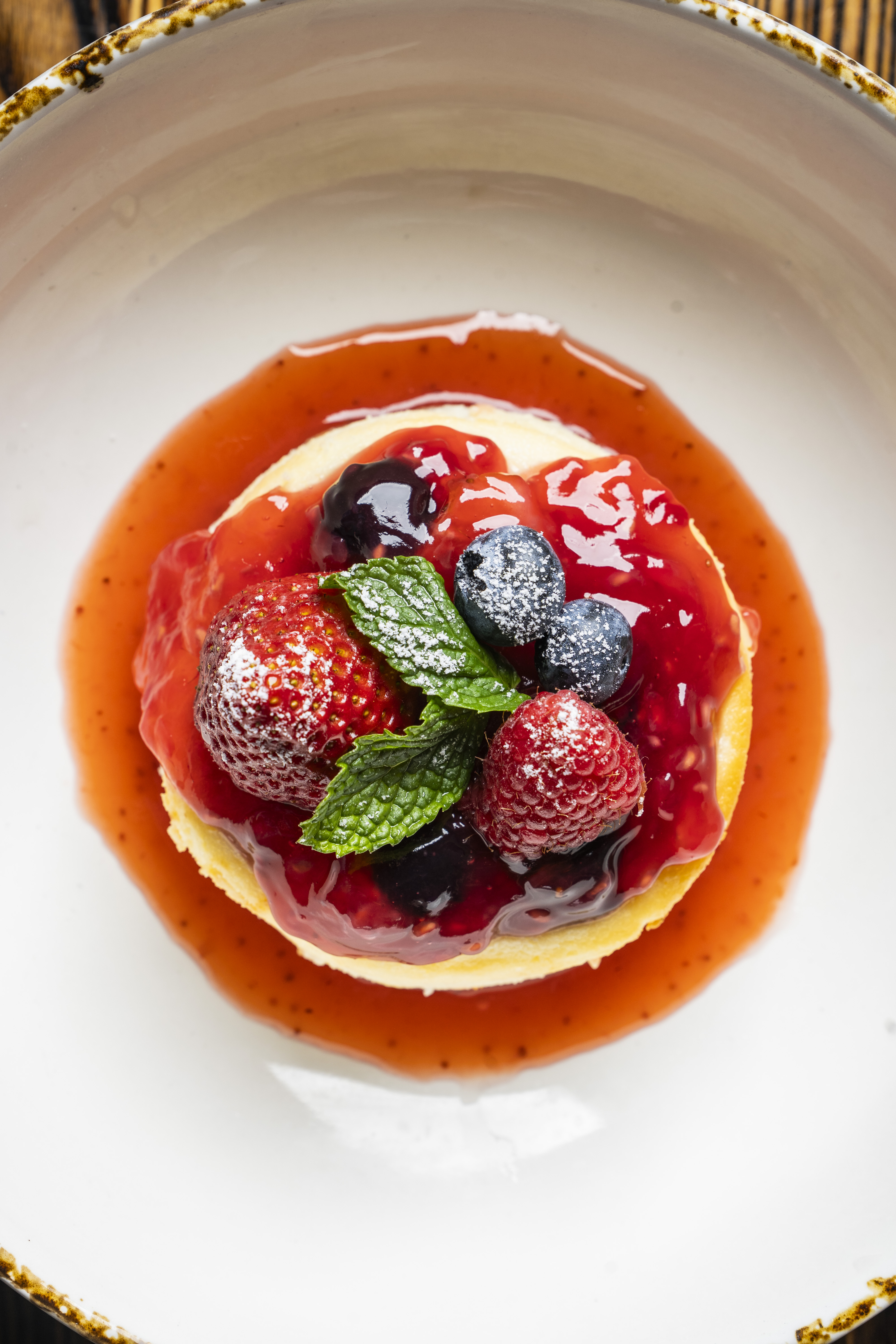a dessert with fruit on top