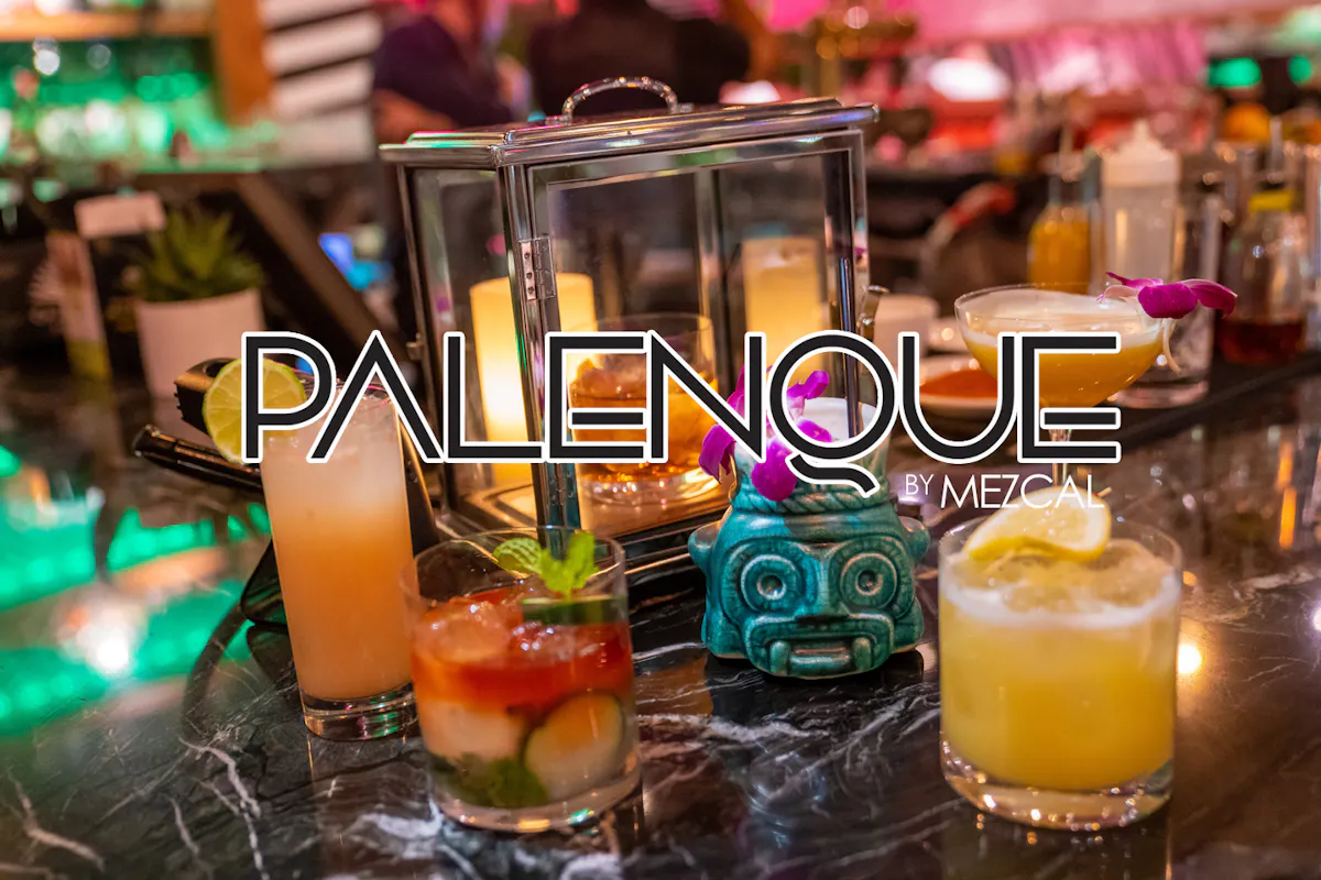 a glass of beer on a table