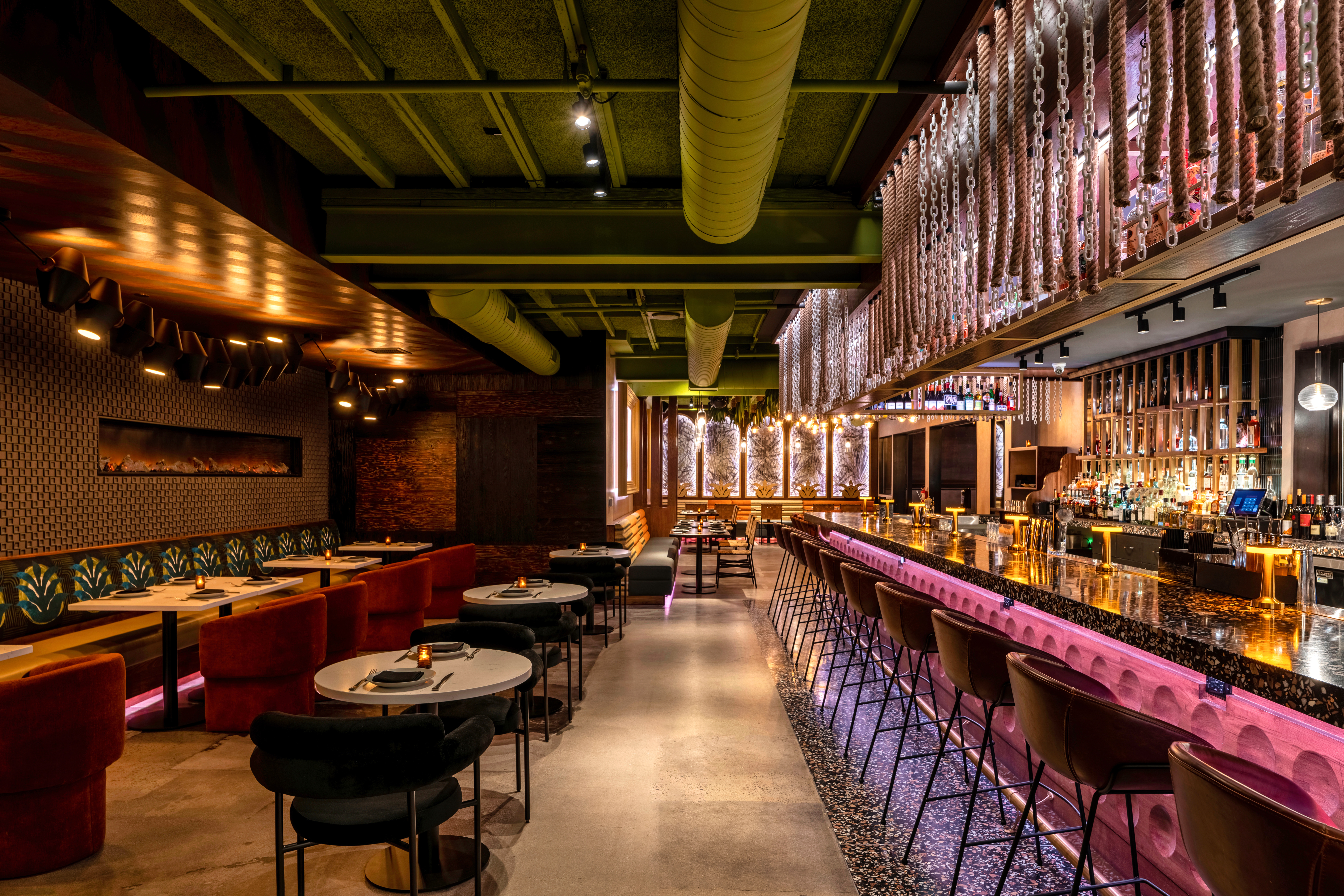 a group of people sitting at a train station
