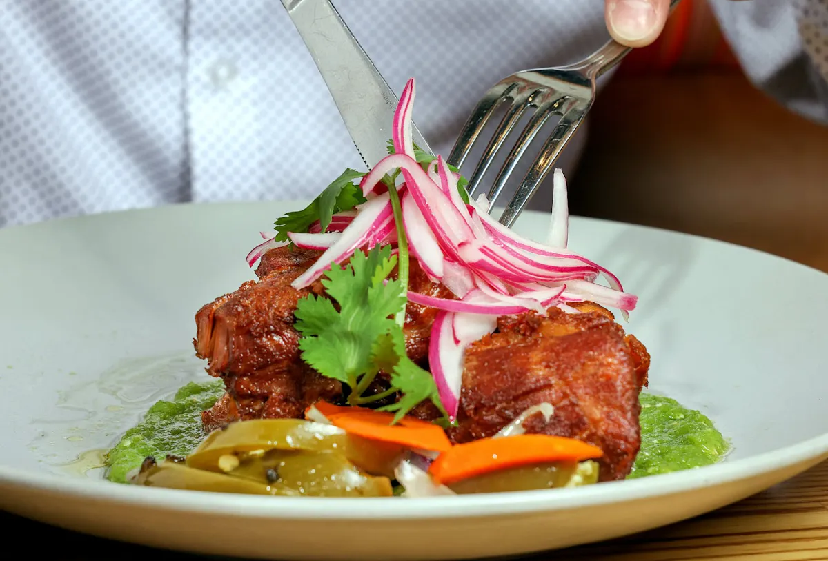 a plate of food with a fork