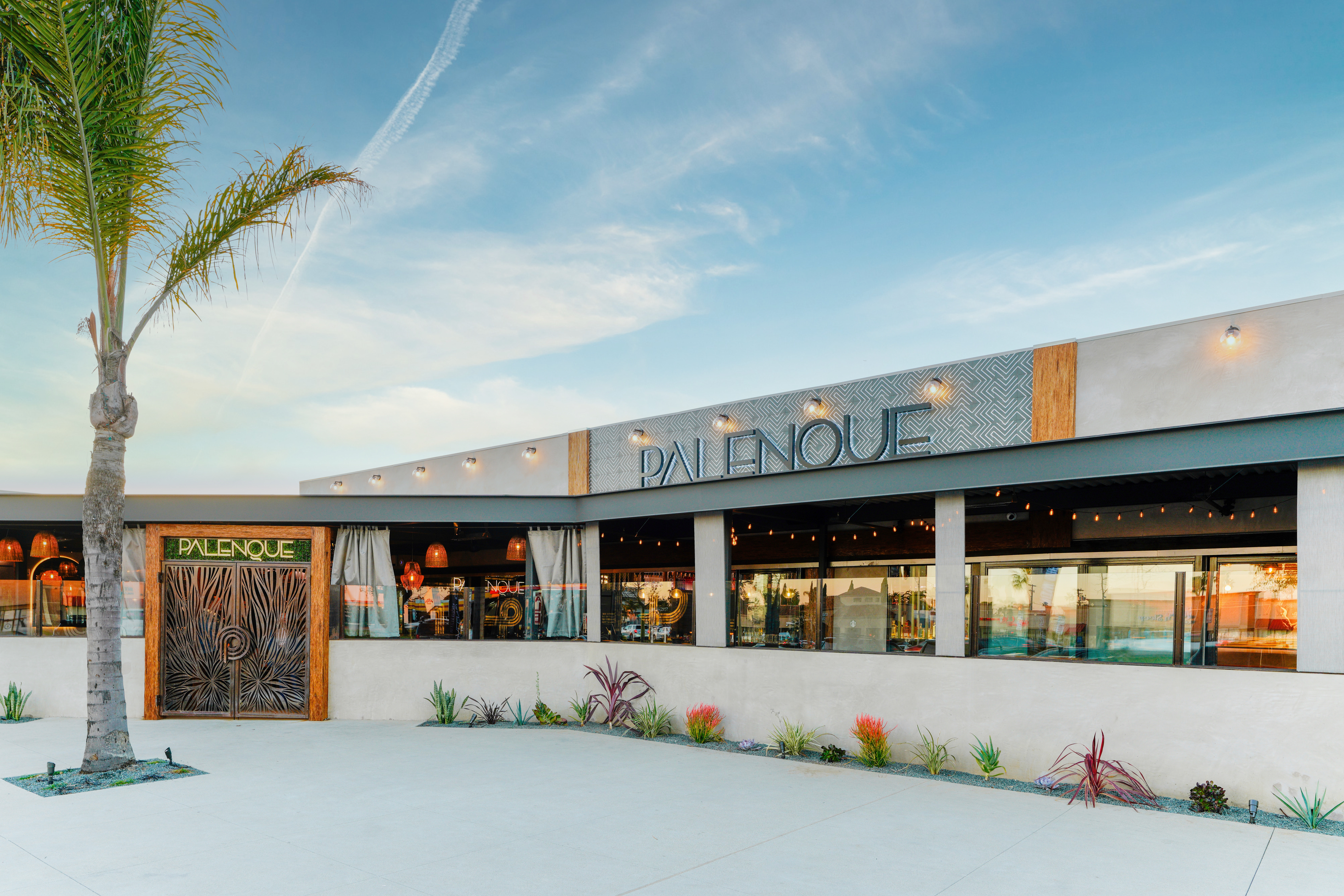 a group of people in front of a building