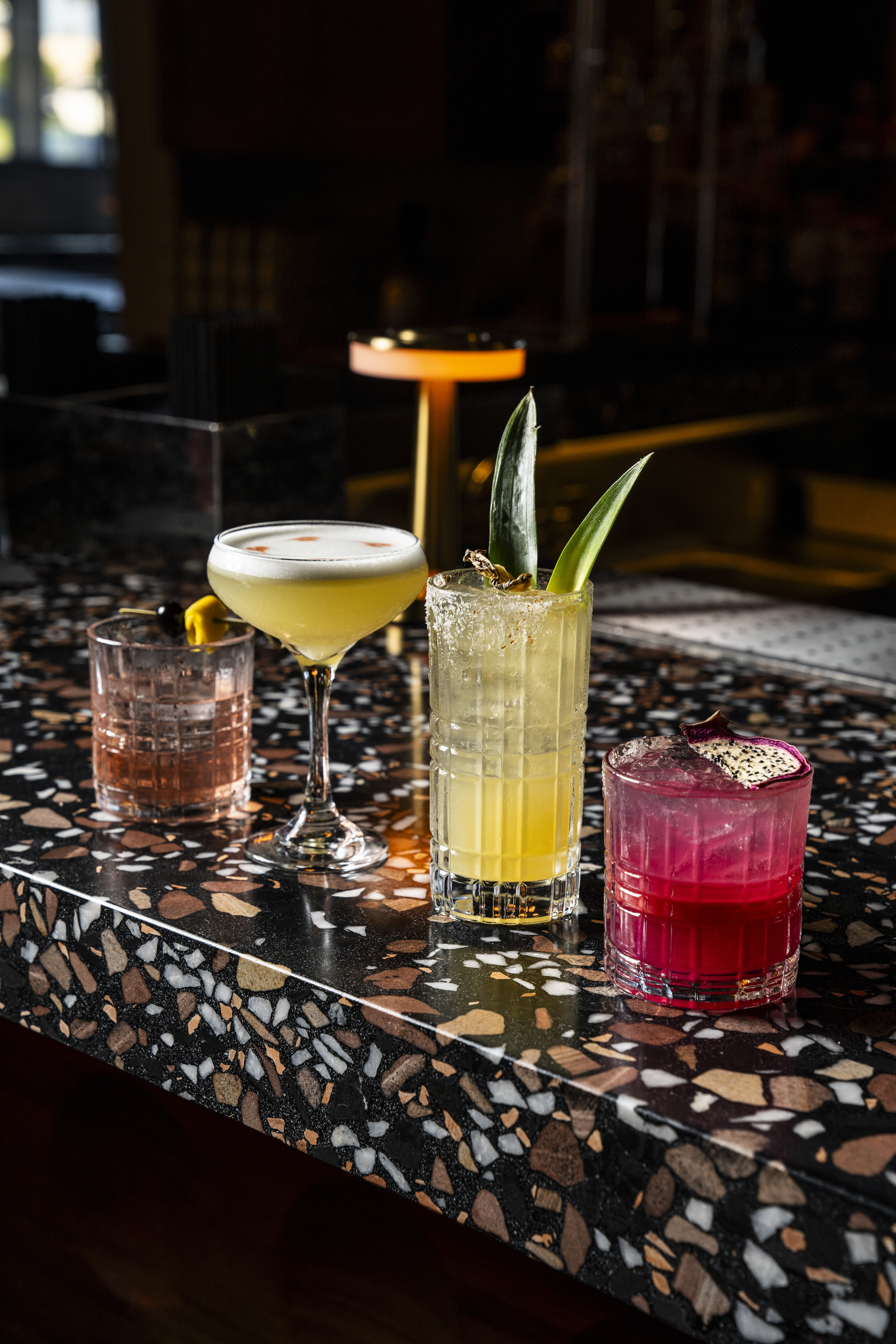a group of drinks on a counter